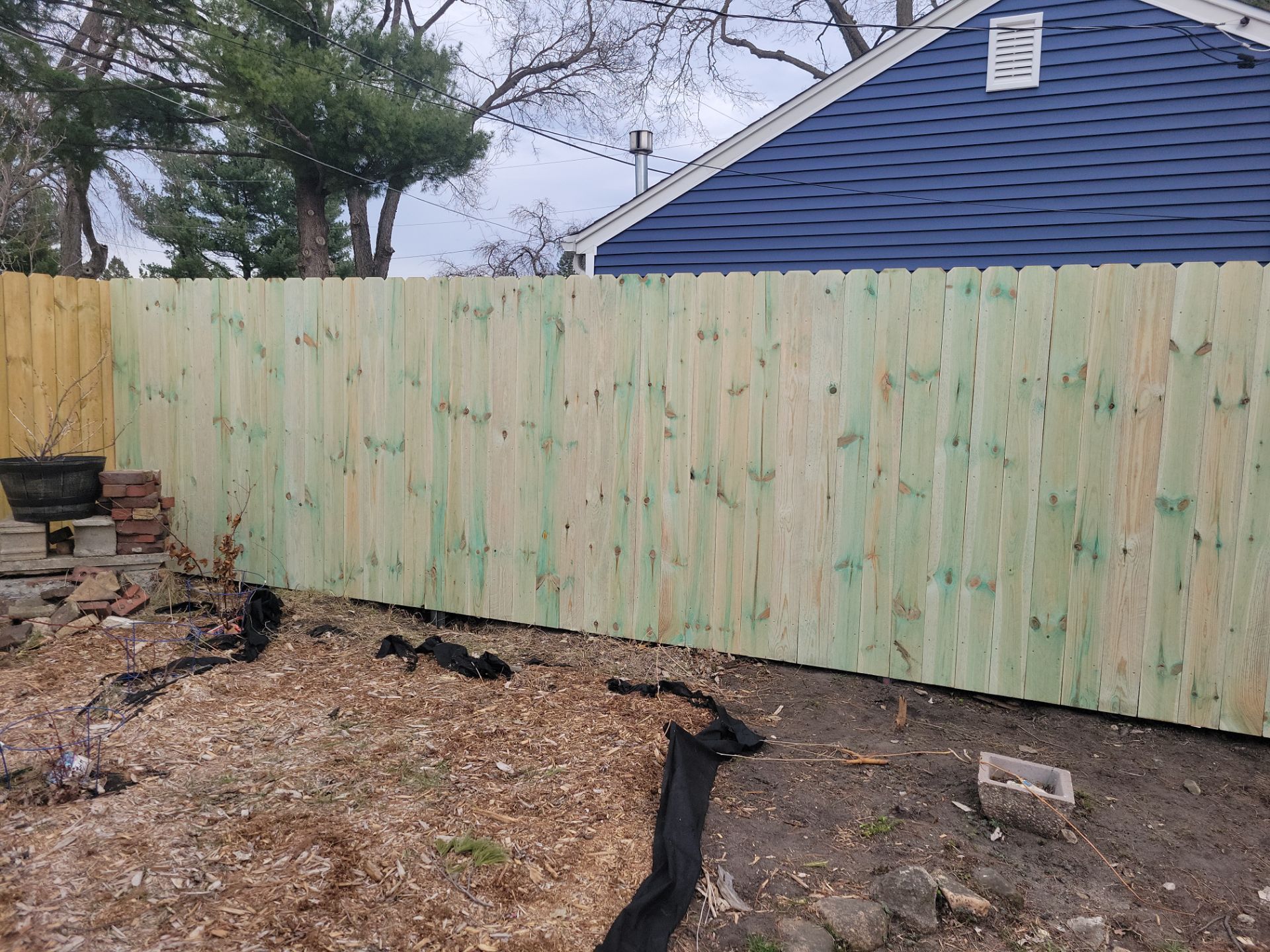 Custom Wood Privacy Fence and Gate Installation in Waterloo by Perfect Picket Fence and Stain