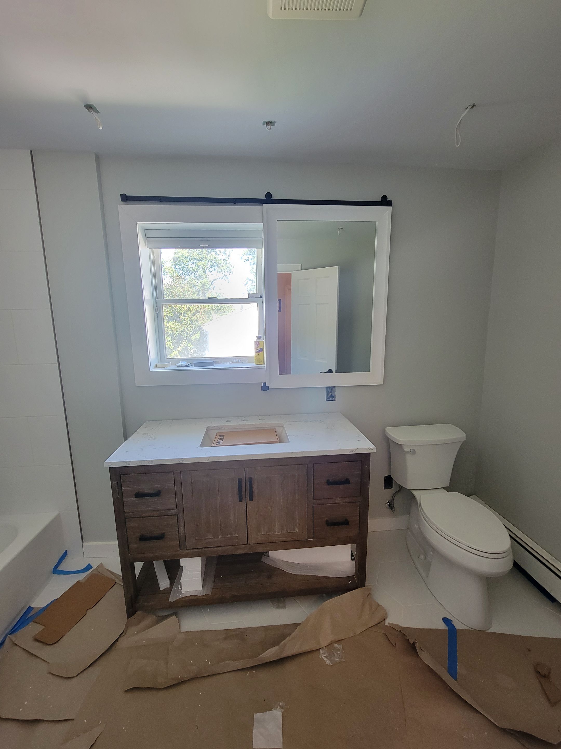 Kids bathroom Upgrade by Cedar Contractors Group, Inc.