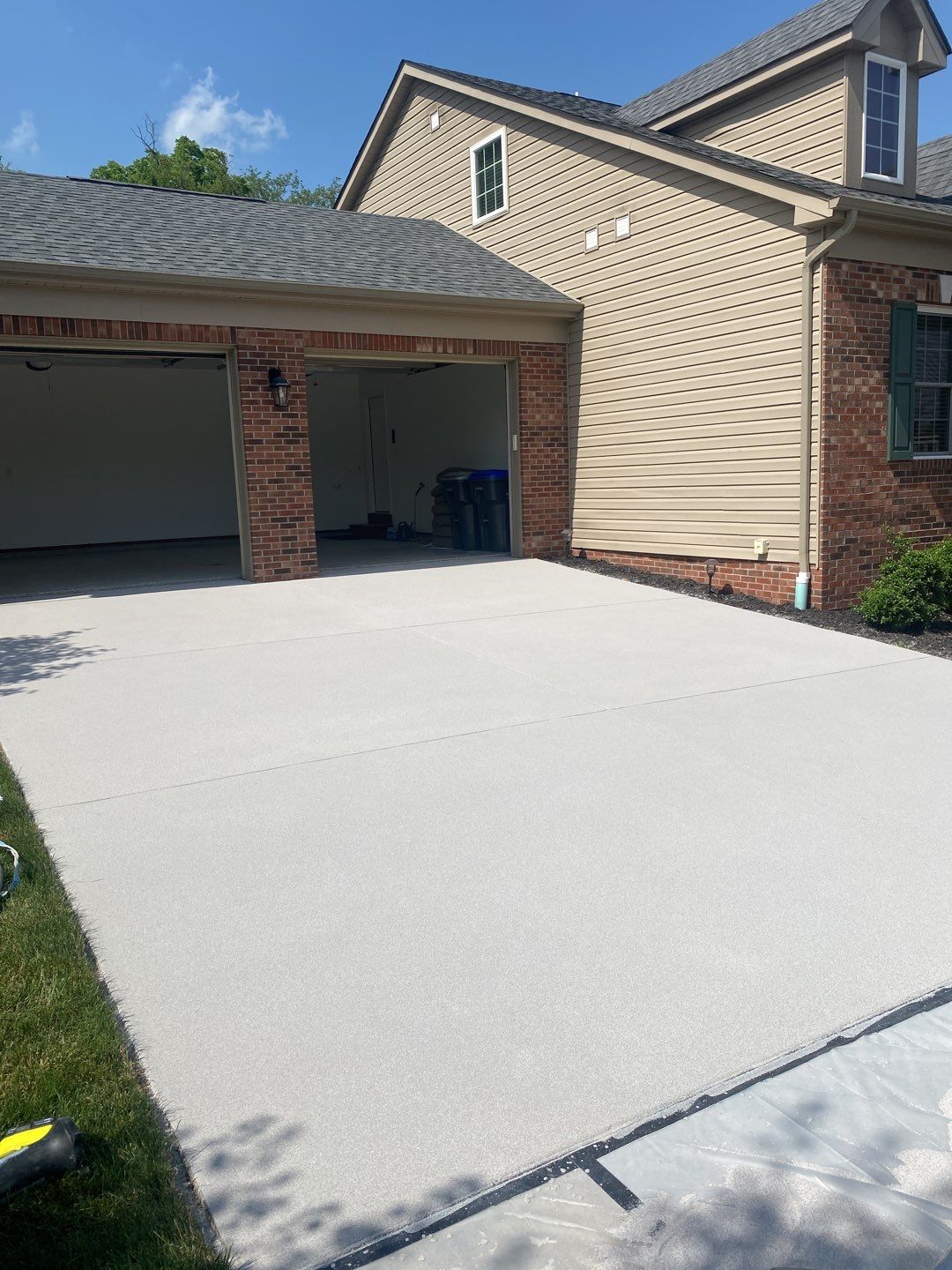Driveway + Garage Project in Cranberry Township by Floors in a Day, Inc