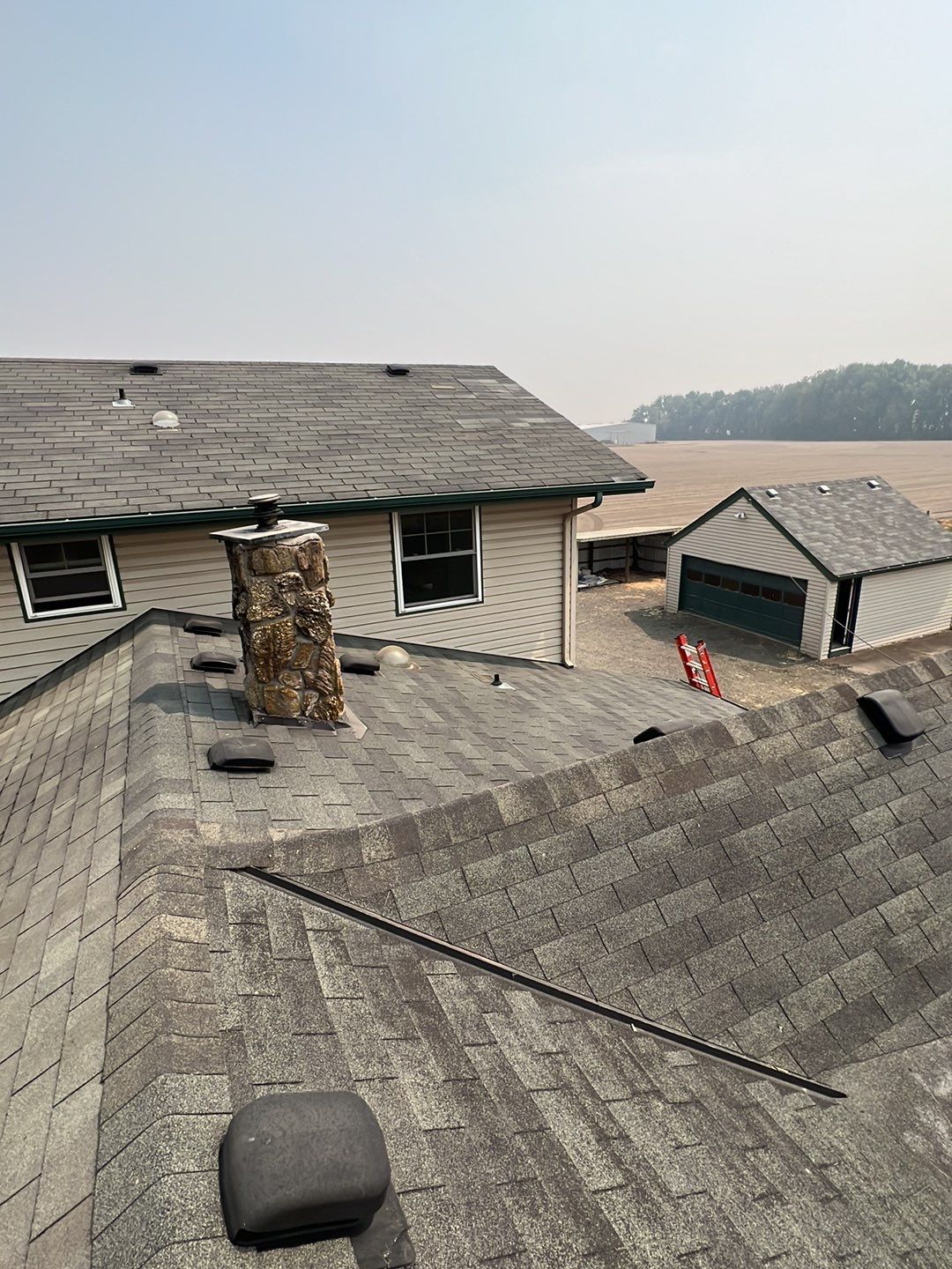 Residential Roofing Installation using IKO Dynasty (Color: Granite Black) by Orezona Building & Roofing Company, Inc.