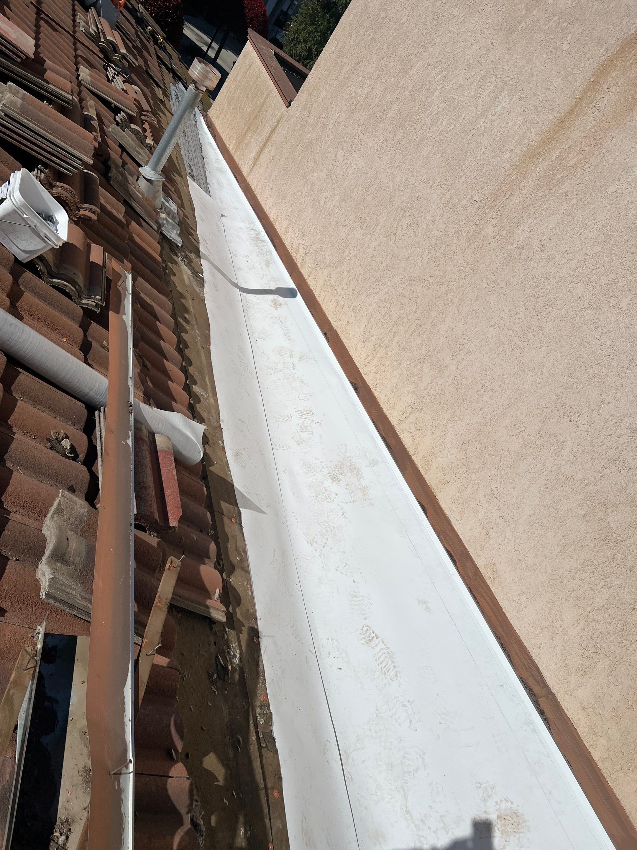 Tile Roof repair by Grandmark Service Company