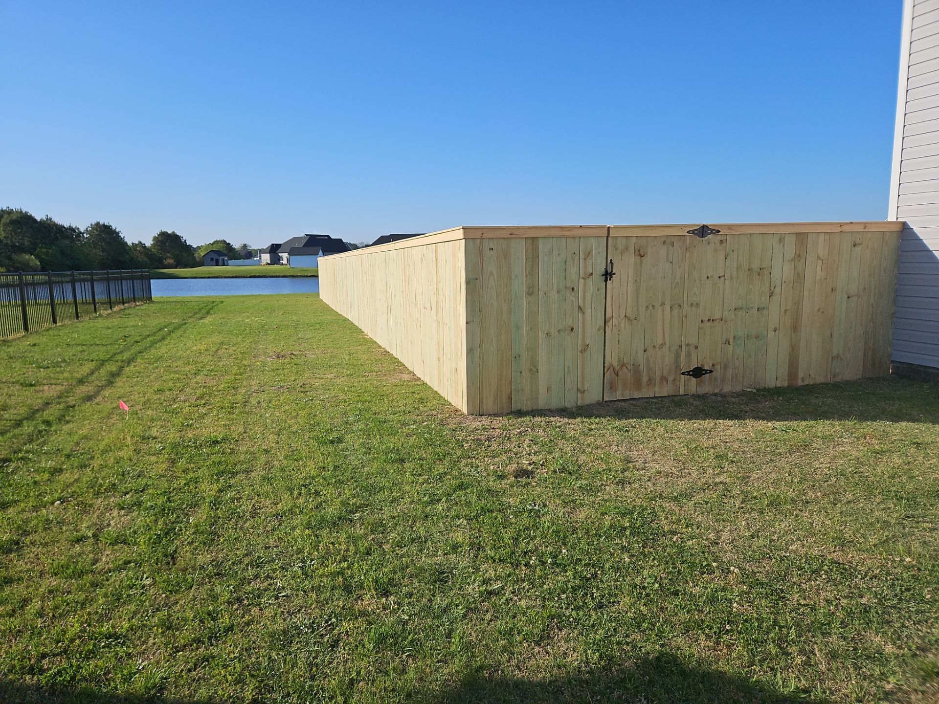 Stronger. Sleeker. Wood. by Tidewater Fence