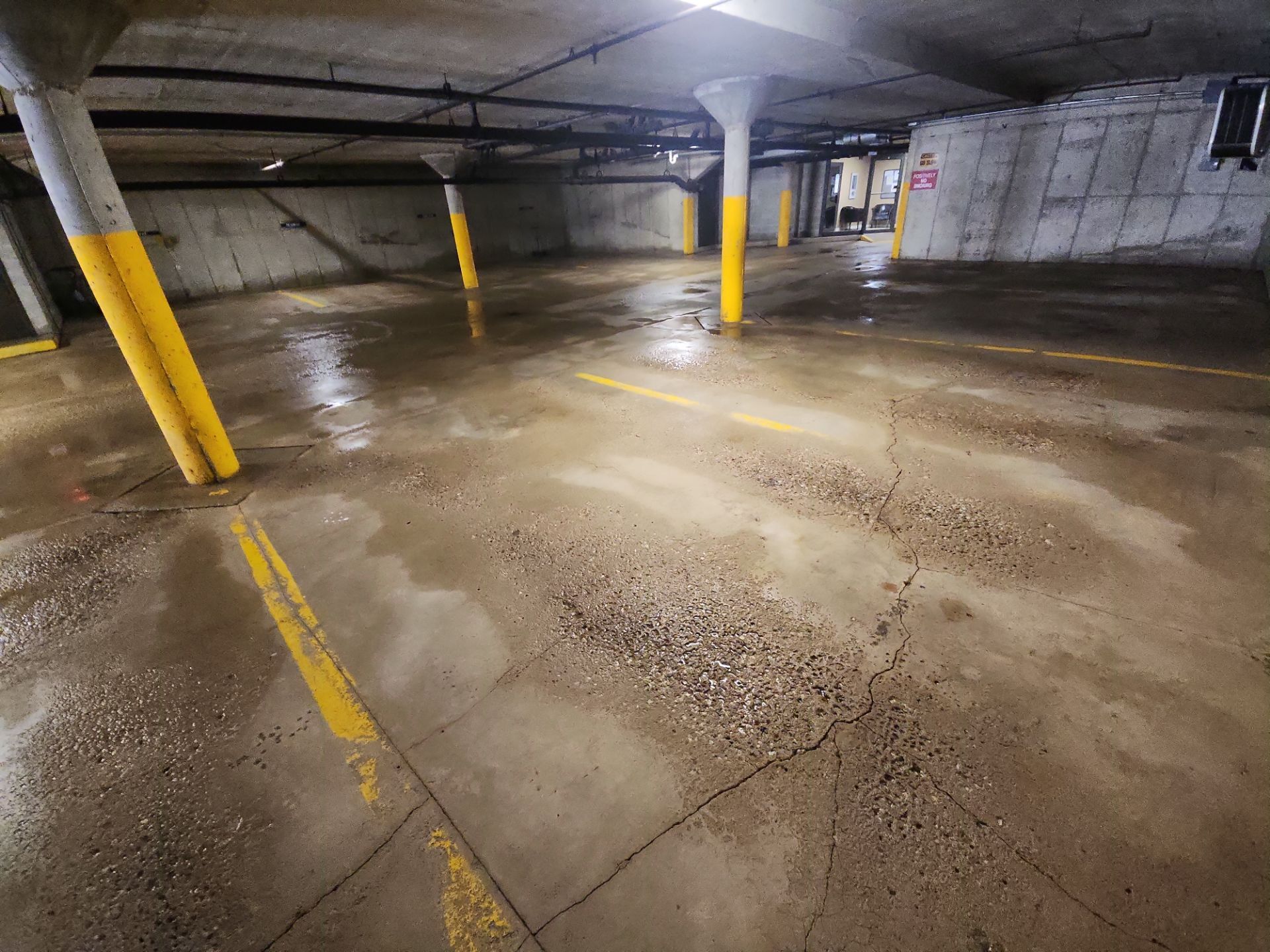 Parking garage cleaning by Northern Power Washing LLC.