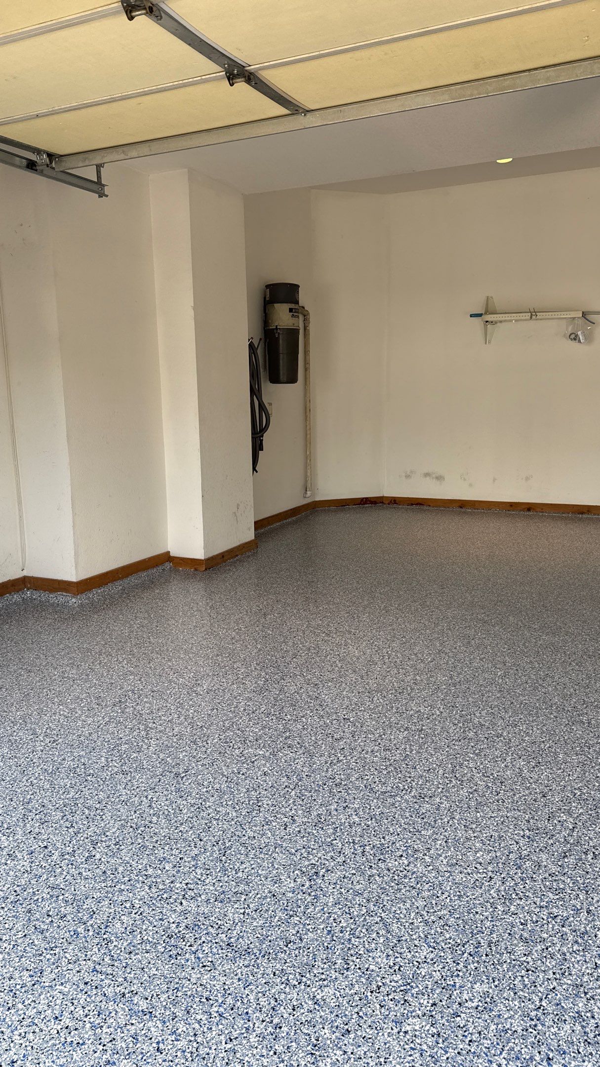 Custom "Comet" Epoxy Garage Floor Renovation in Lawrence by Banner Garage