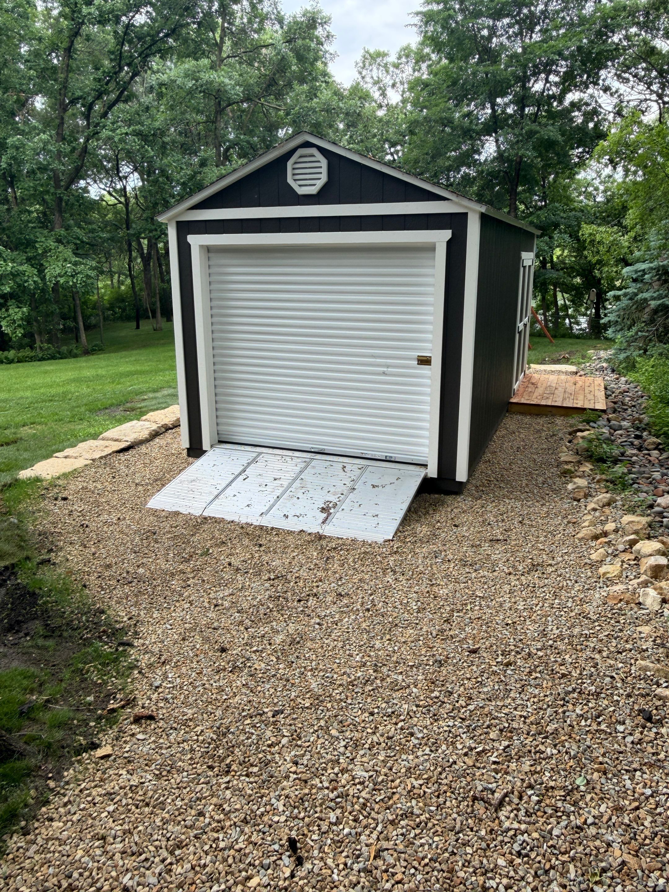 Limestone Boulder Wall  by Sota landscaping