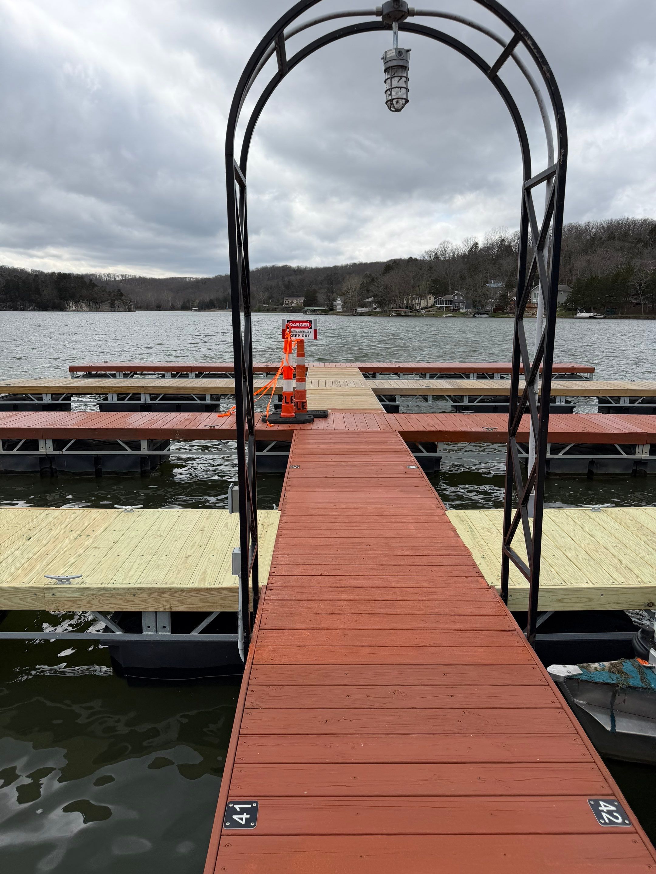 Floating Boat Dock Board Replacement and Staining in New Florence by Acute Roofing And Exteriors