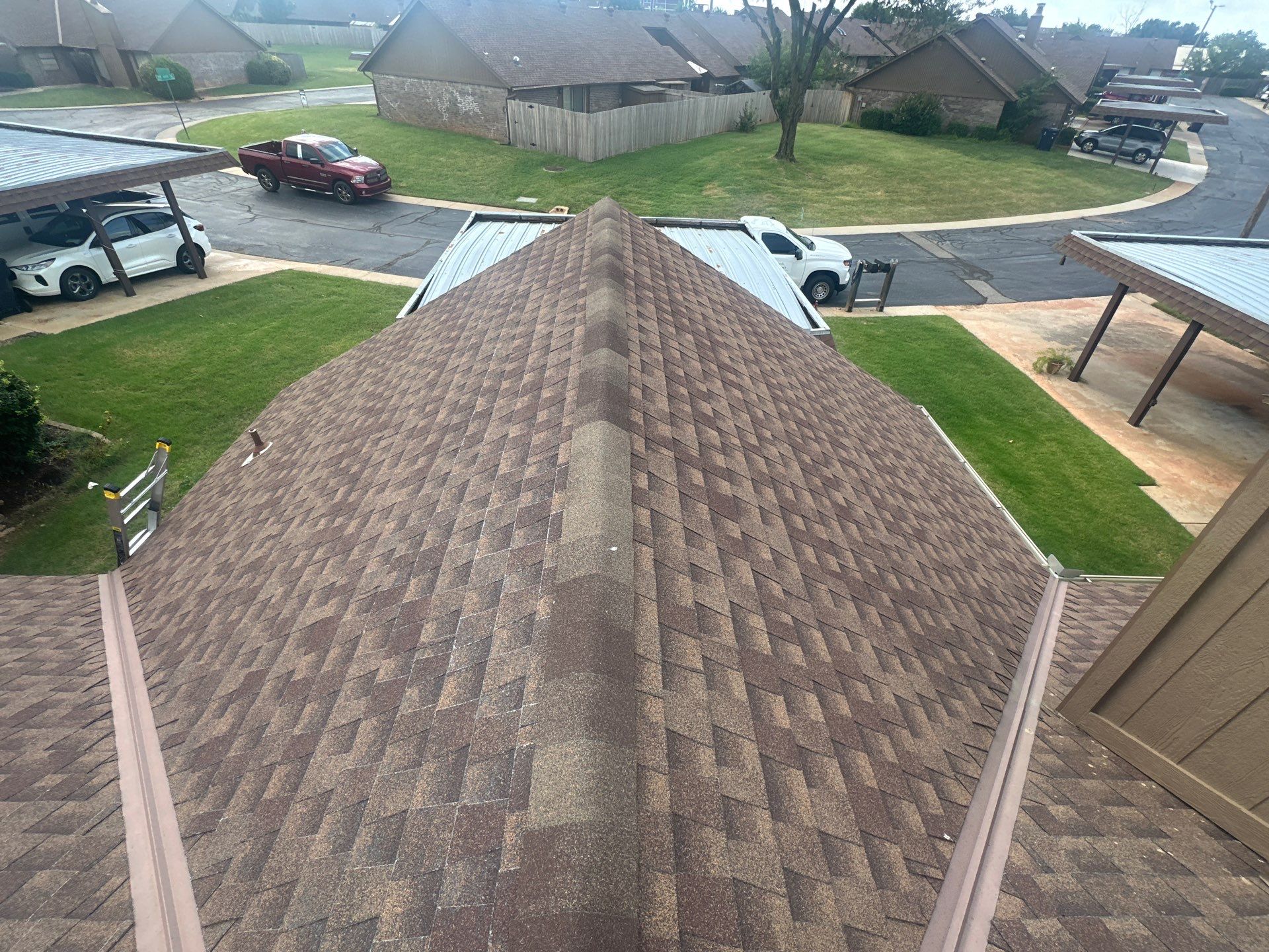 Hail Damage Roof Inspection in Oklahoma City, OK by McCann's Roofing and Construction