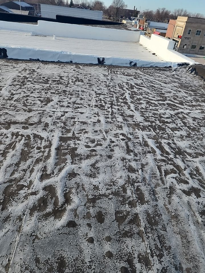 Recover of a downtown building  by Grell Roofing, LLC