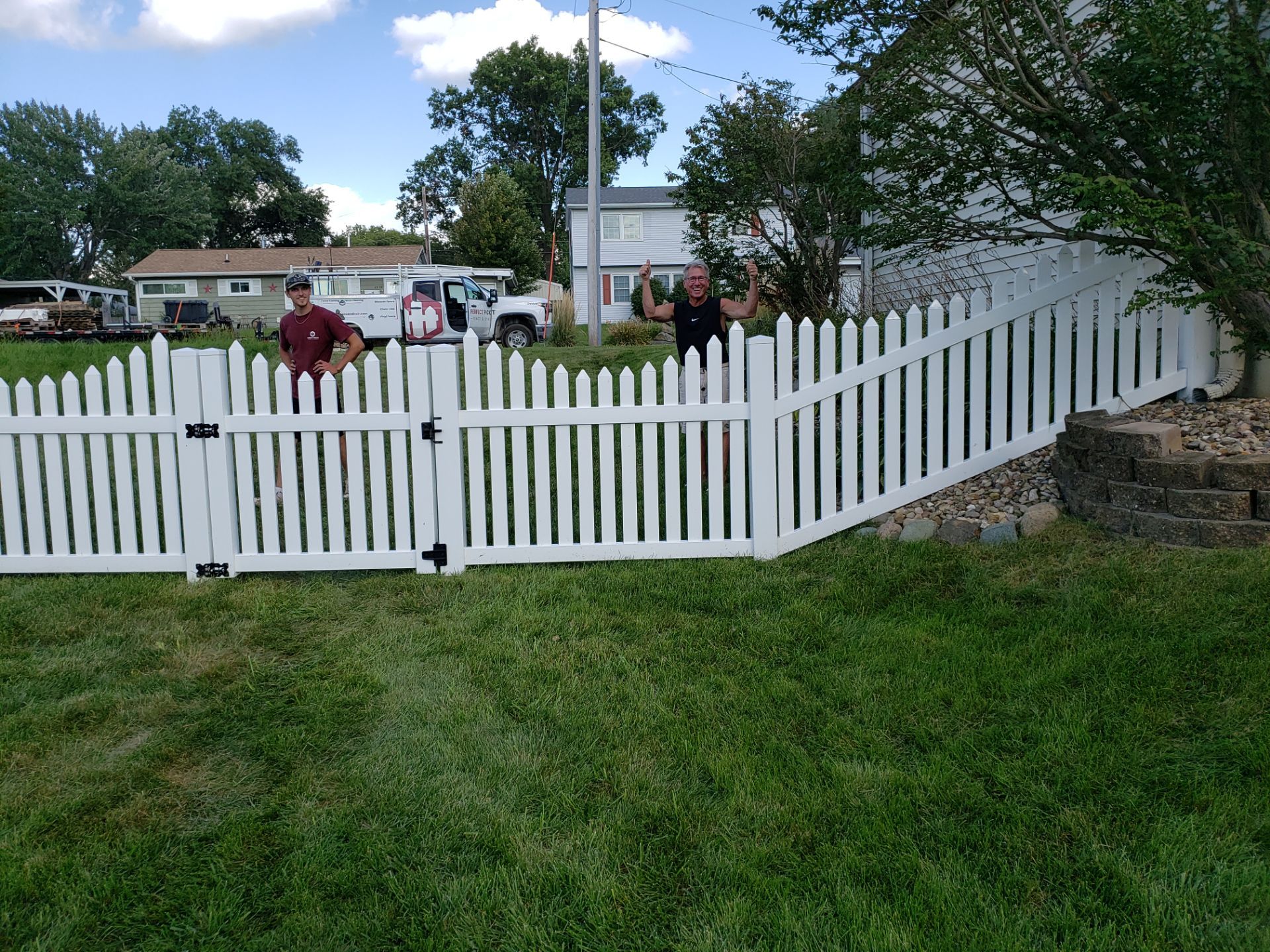 White Vinyl Spaced Picket Fence Installation in Waterloo by Perfect Picket Fence and Stain