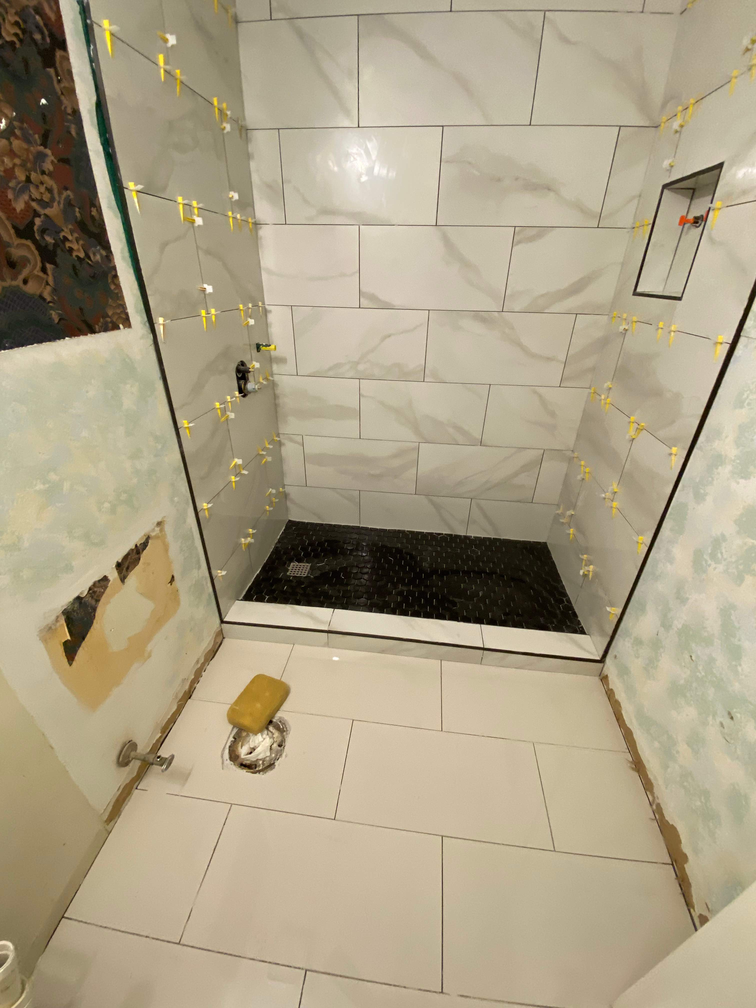 Tub to walk-in shower conversion by Prudencio