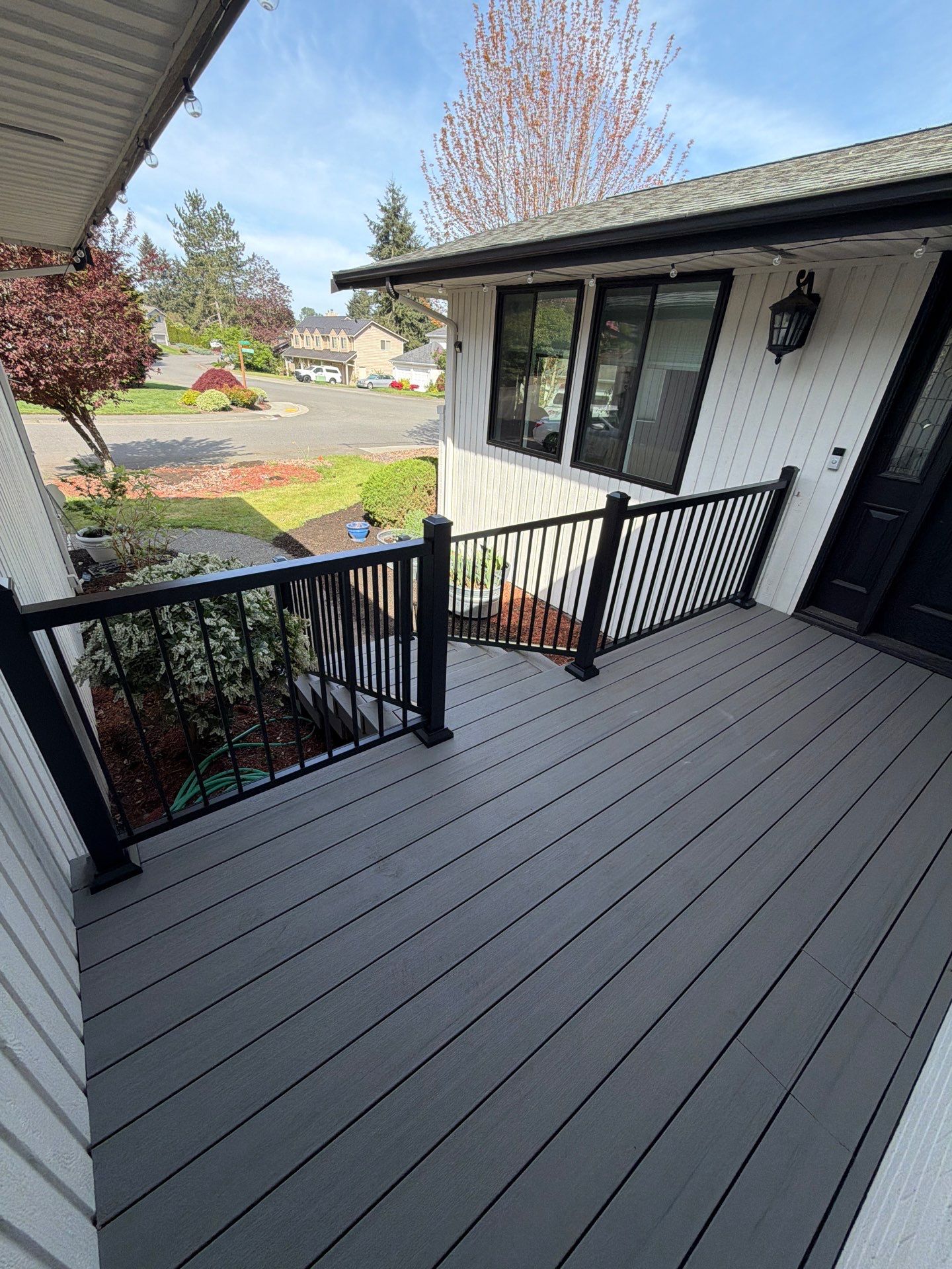 Renton Deck Transformation | TimberTech® Prime+ Dark Cocoa & Sea Salt Gray with Black Railing by Emerald City Energy