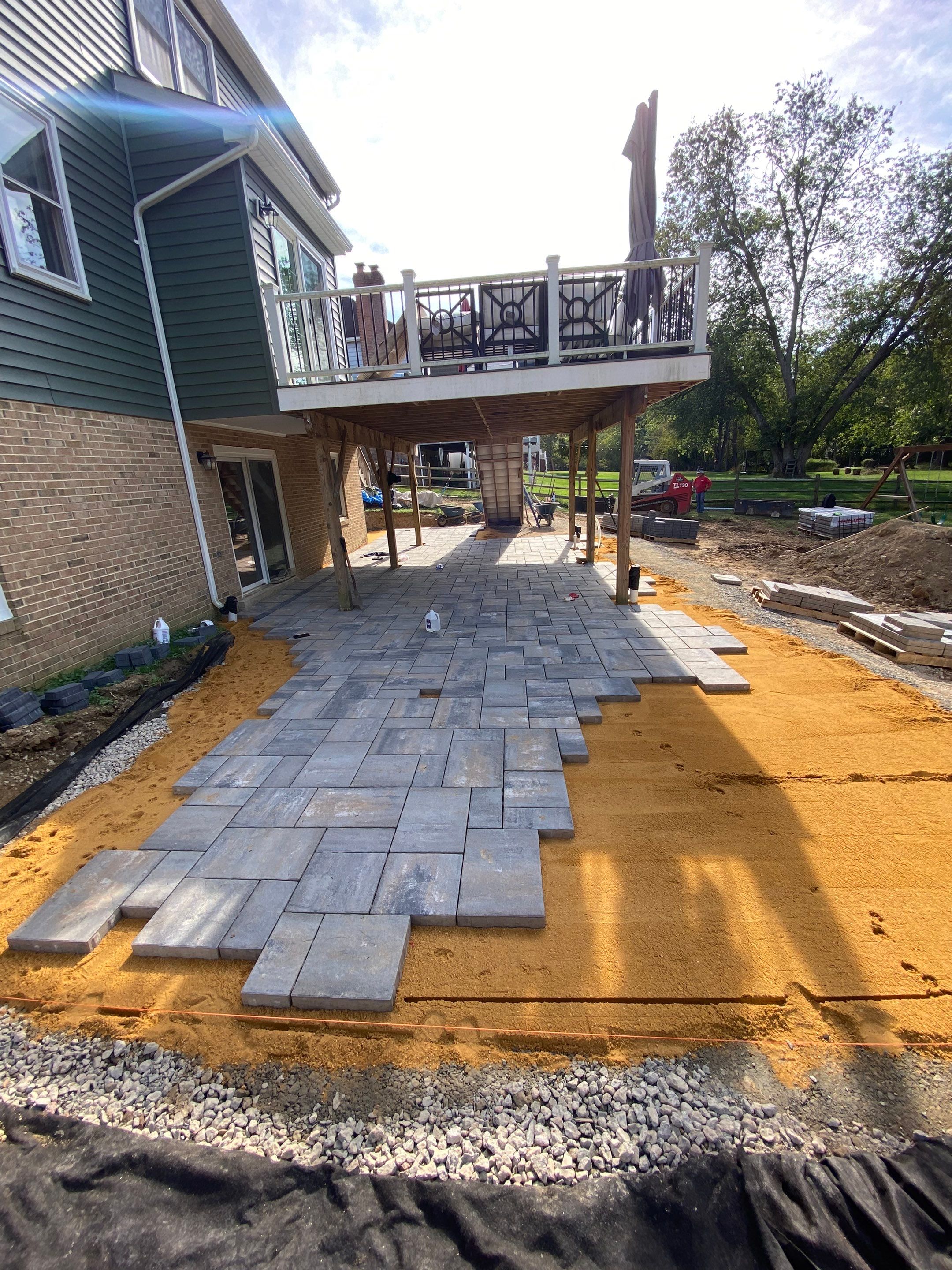 Backyard Transformation using Techo-Bloc Pavers by The Smet Companies, LLC