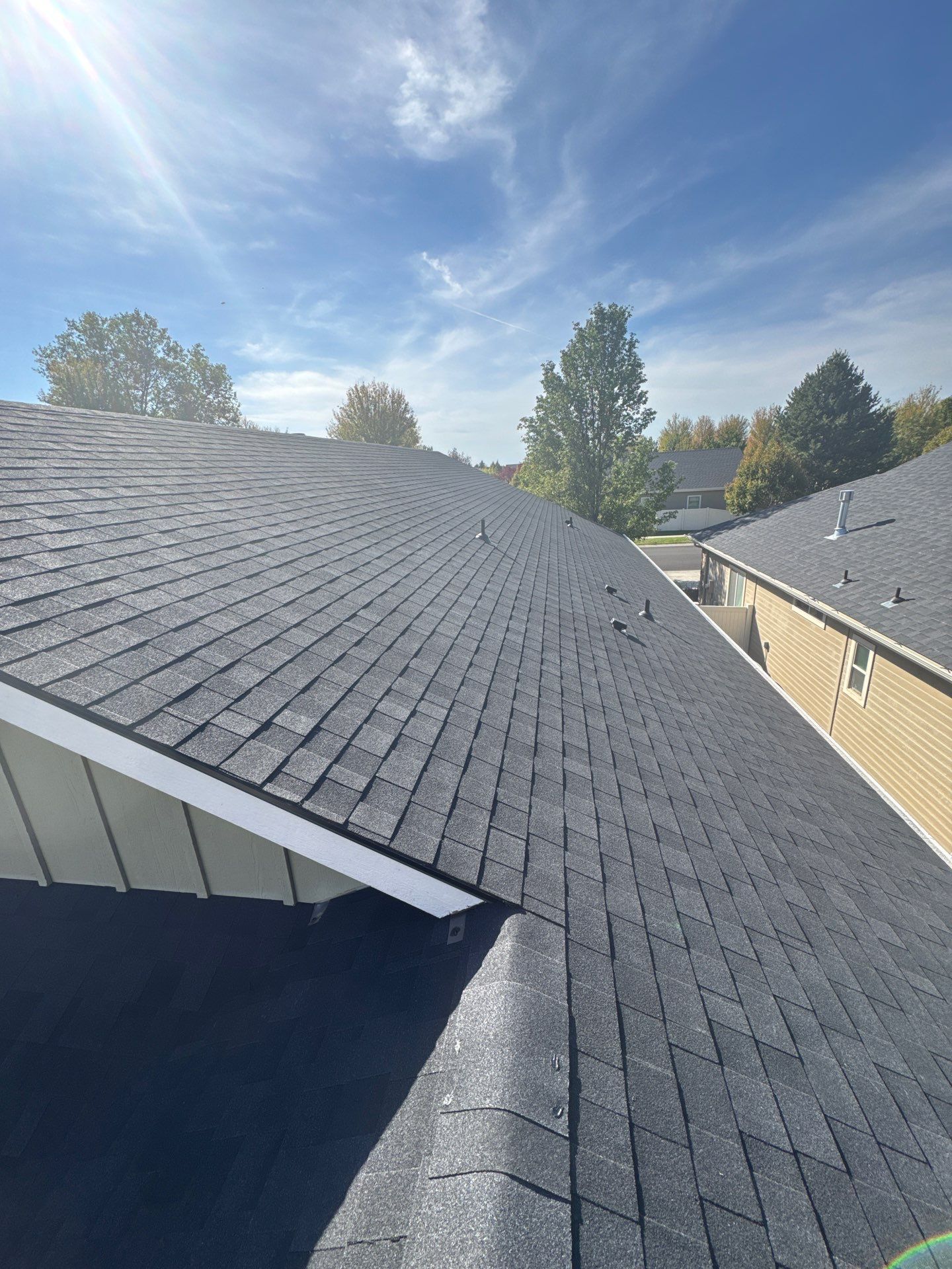 Residential Roof Replacement With Charcoal Architectural Shingles in Meridian by Olive Roofing