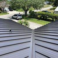 24ga 1.5" Mechanical Seam Dark Bronze by Total Roofing System The Metal Roof Experts