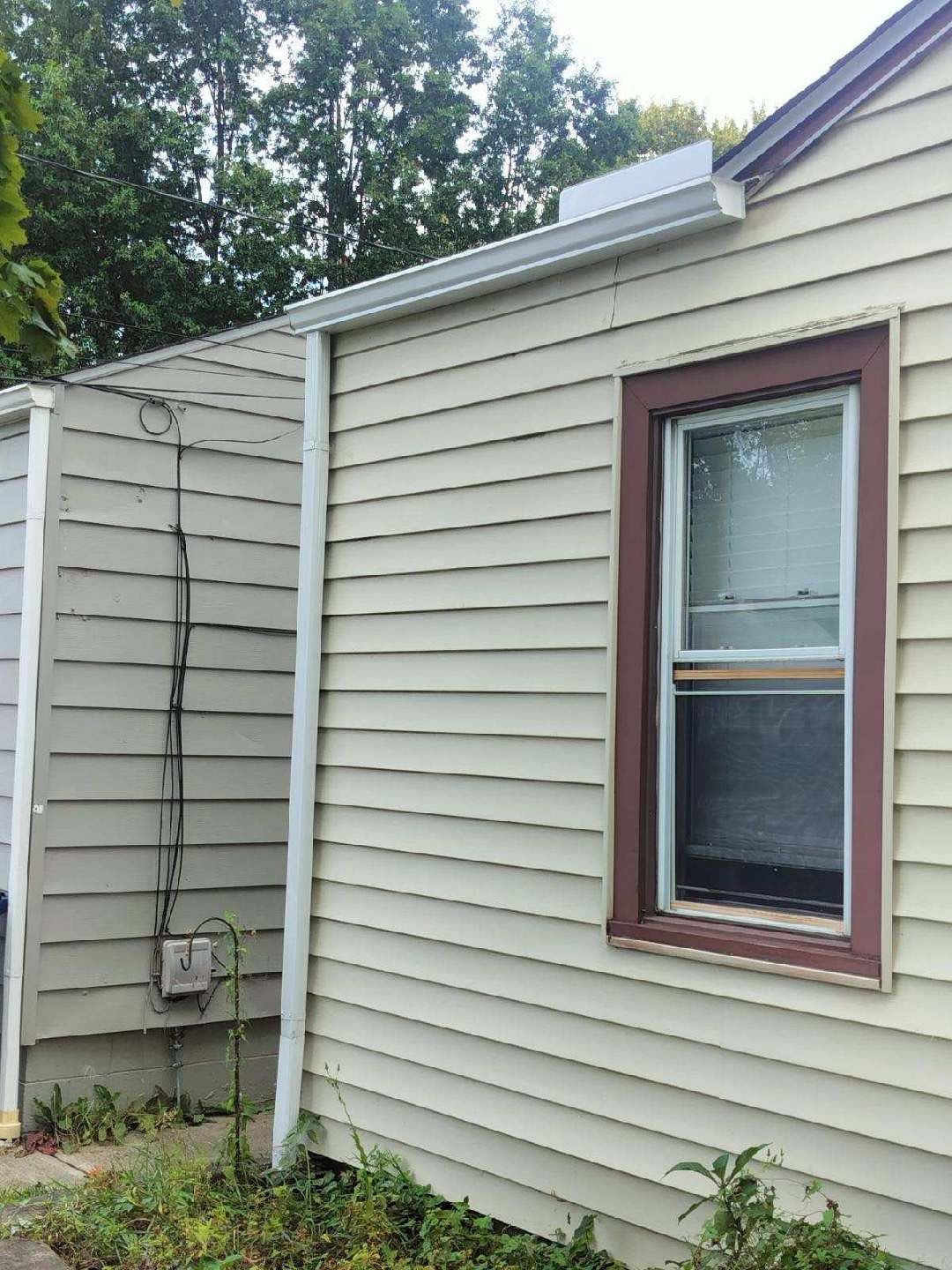 East Lake Roof & Garage  Replacement (With Gutters) by Atlas Roofing & Restoration