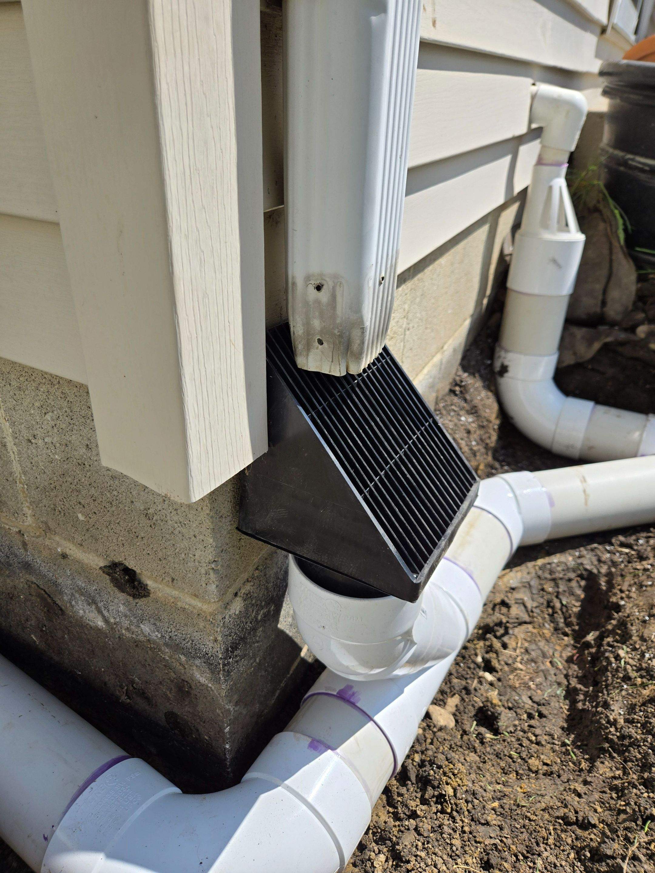 Downspout Discharge and Versatile Water Movement System by Allied Water Services