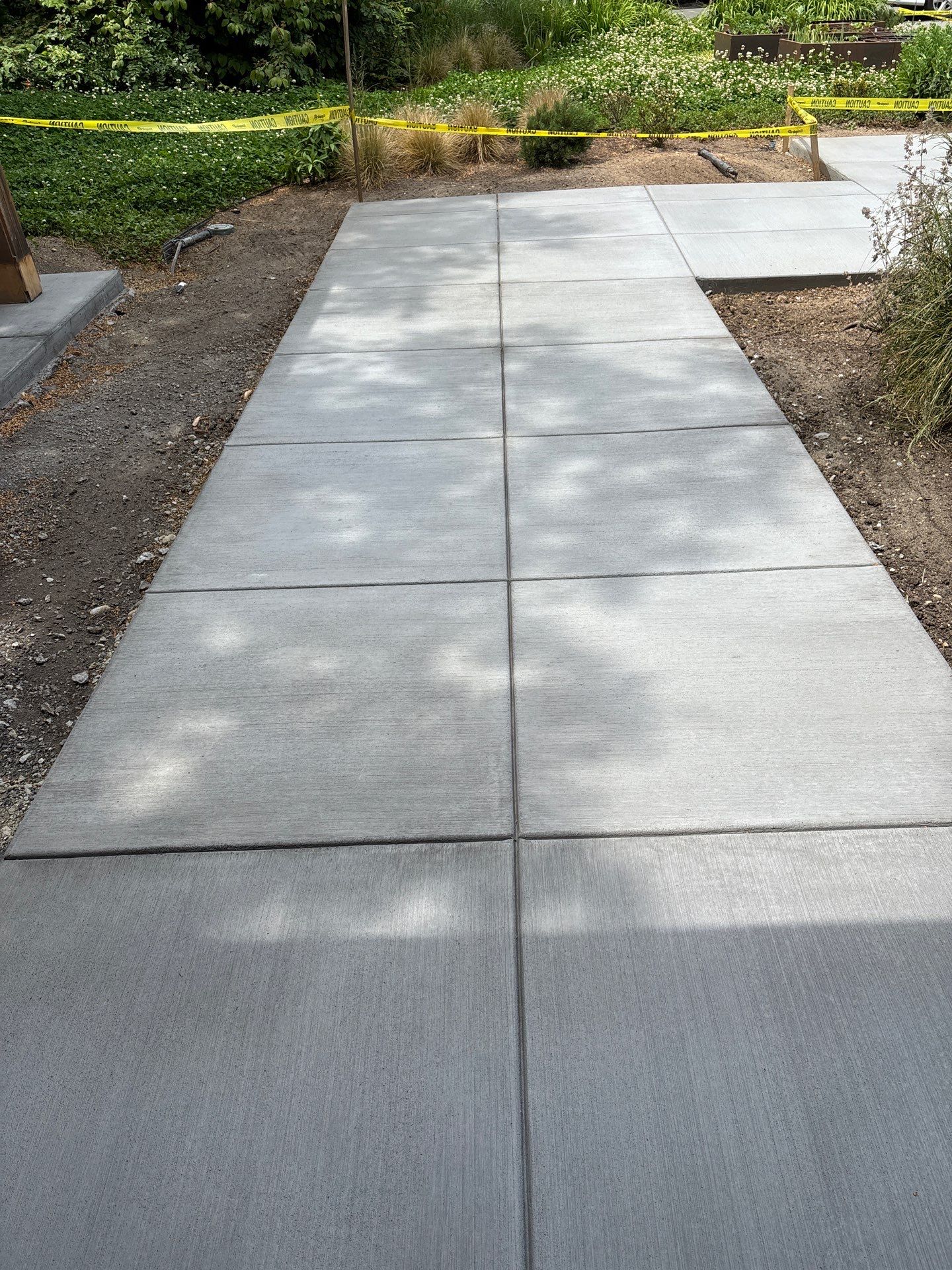 Concrete Driveway Makeover | Edmonds  by Jireh Asphalt & Concrete Inc 