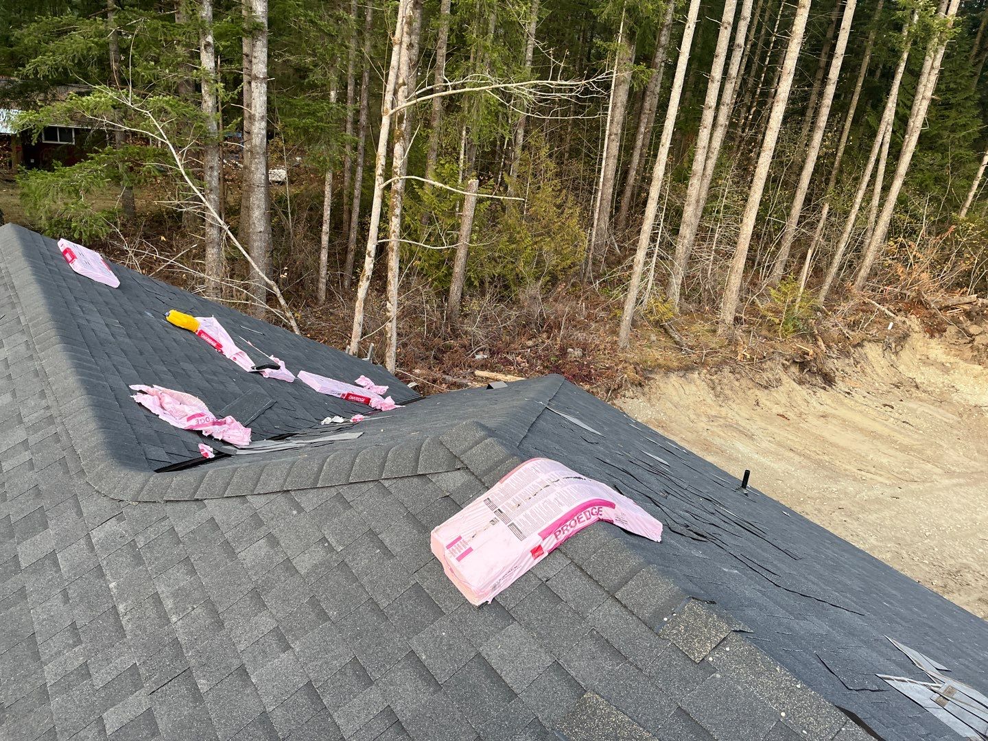 Residential Roofing Installation using OC Oakridge shingles by Top Notch Roofing Inc
