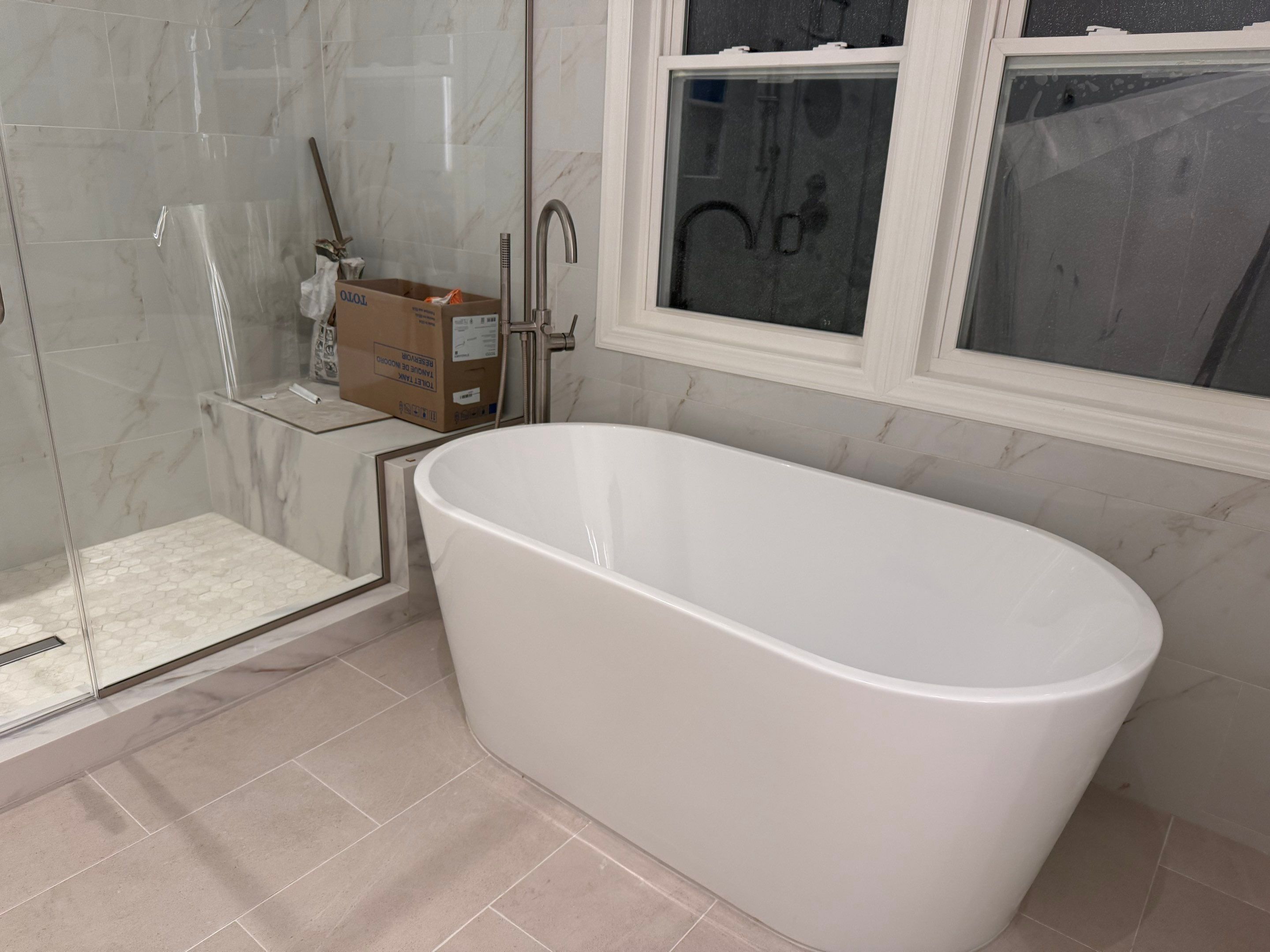 Bathroom Remodel using Tile by Home Concepts Construction