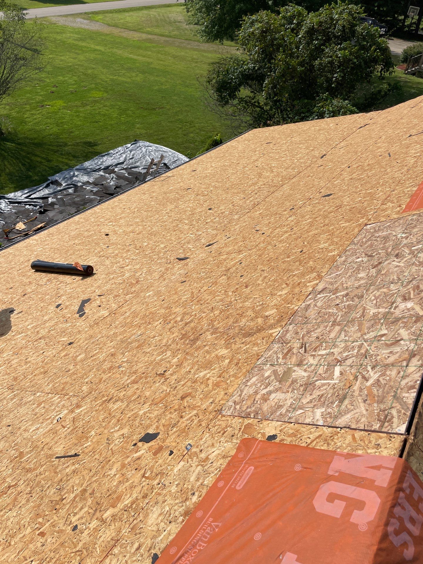 Residential Roofing Installation using GAF Timberline HDZ Charcoal by Rainstoppers Roofing