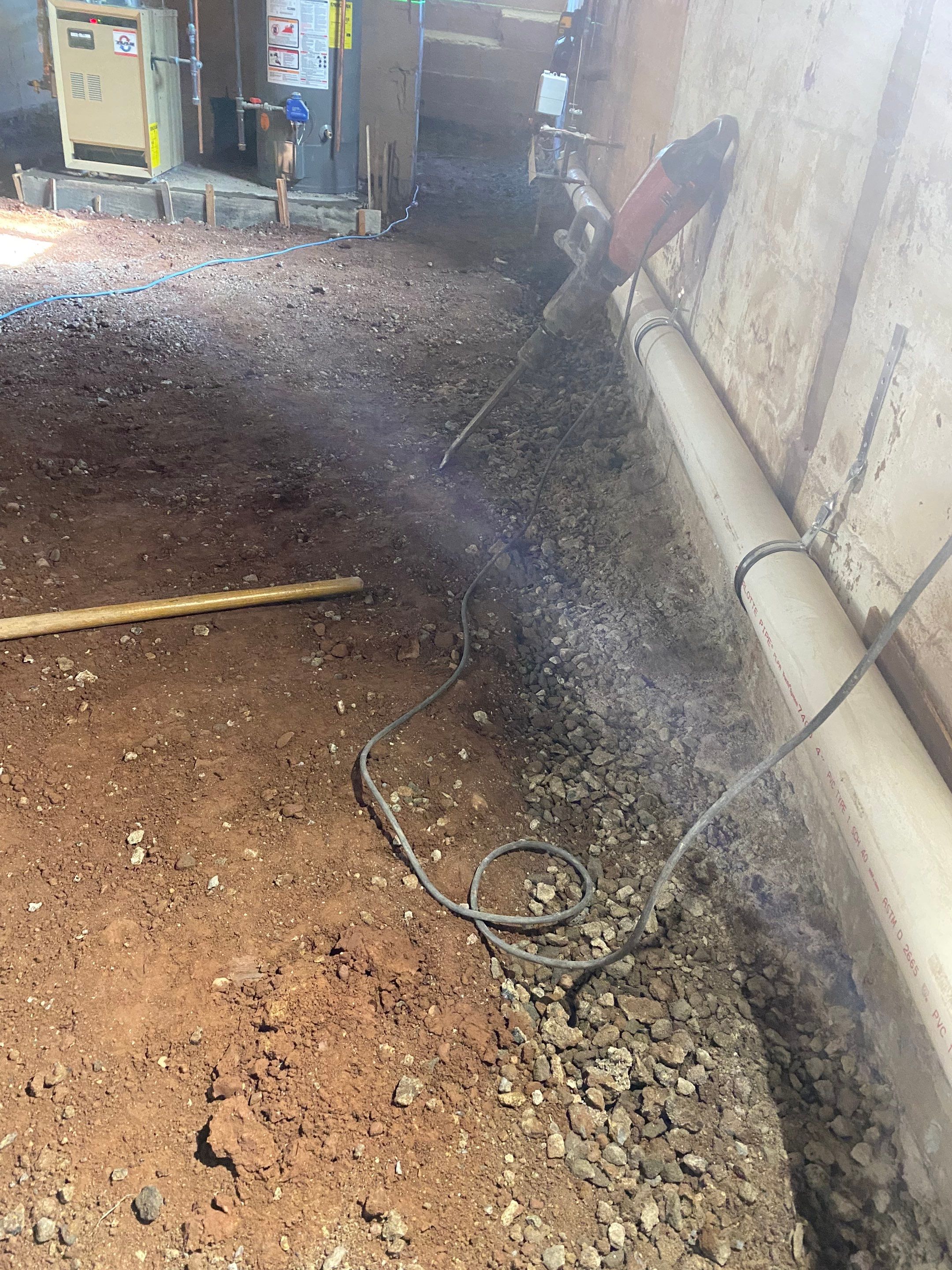 Interior French Drain, Lally Column Replacement & Concrete Floor Replacement in South Orange, NJ by Pure Service Pro, LLC