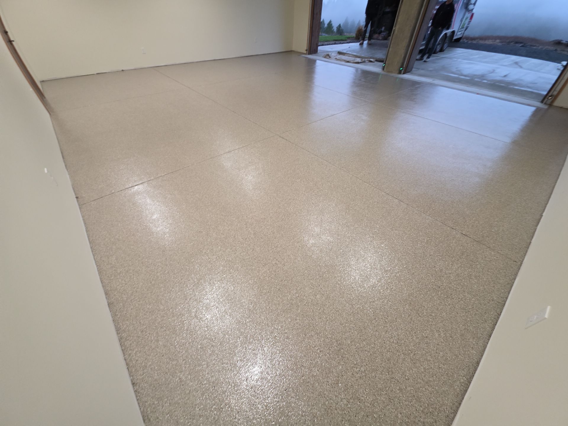 Garage Transformation using Pebble Beach by Croc Coatings, LLC