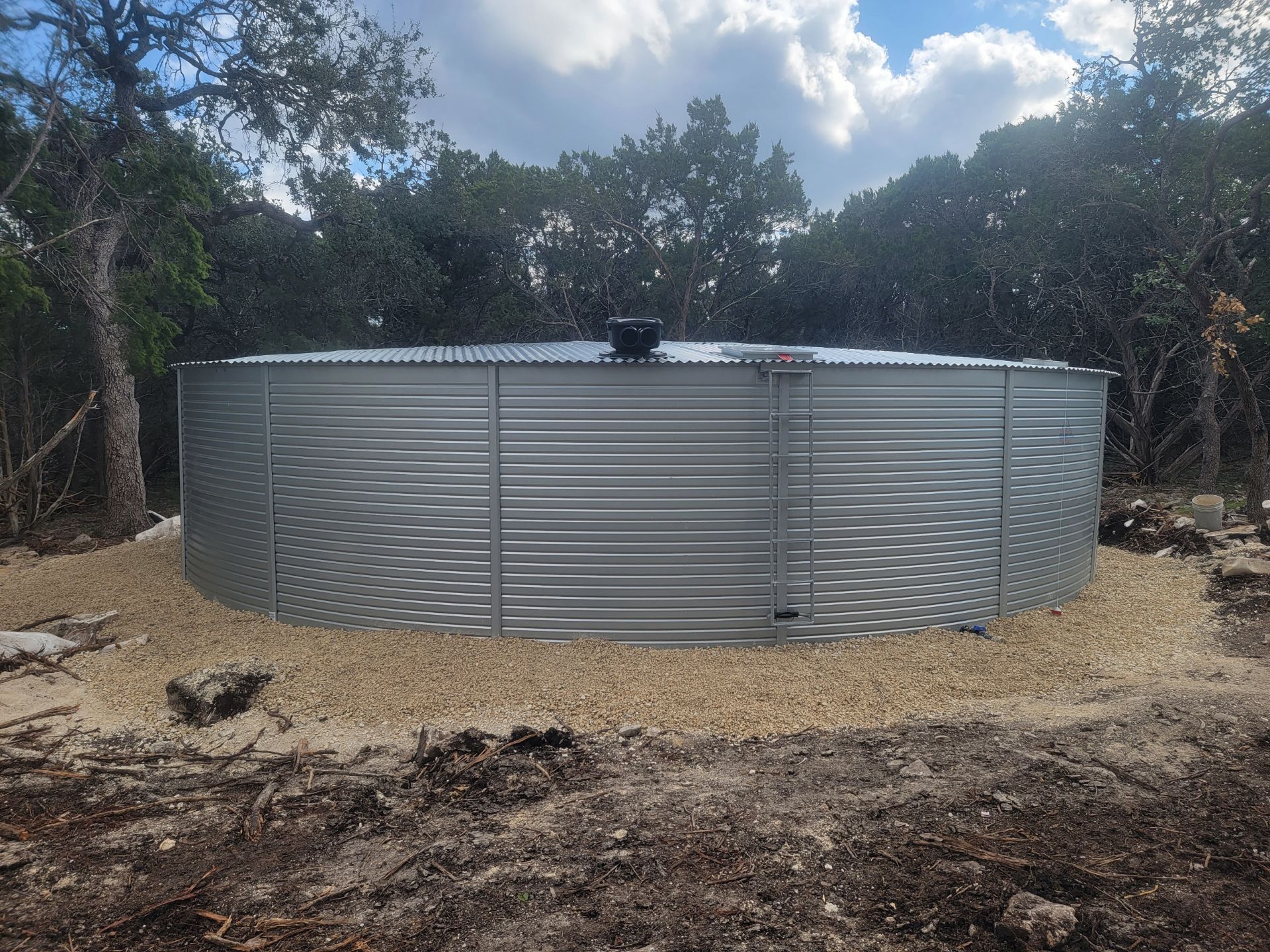 Major Addition using 52000 gallon Pioneer (XLR 40/2 ZN) in silver by Hill Country Rain Water