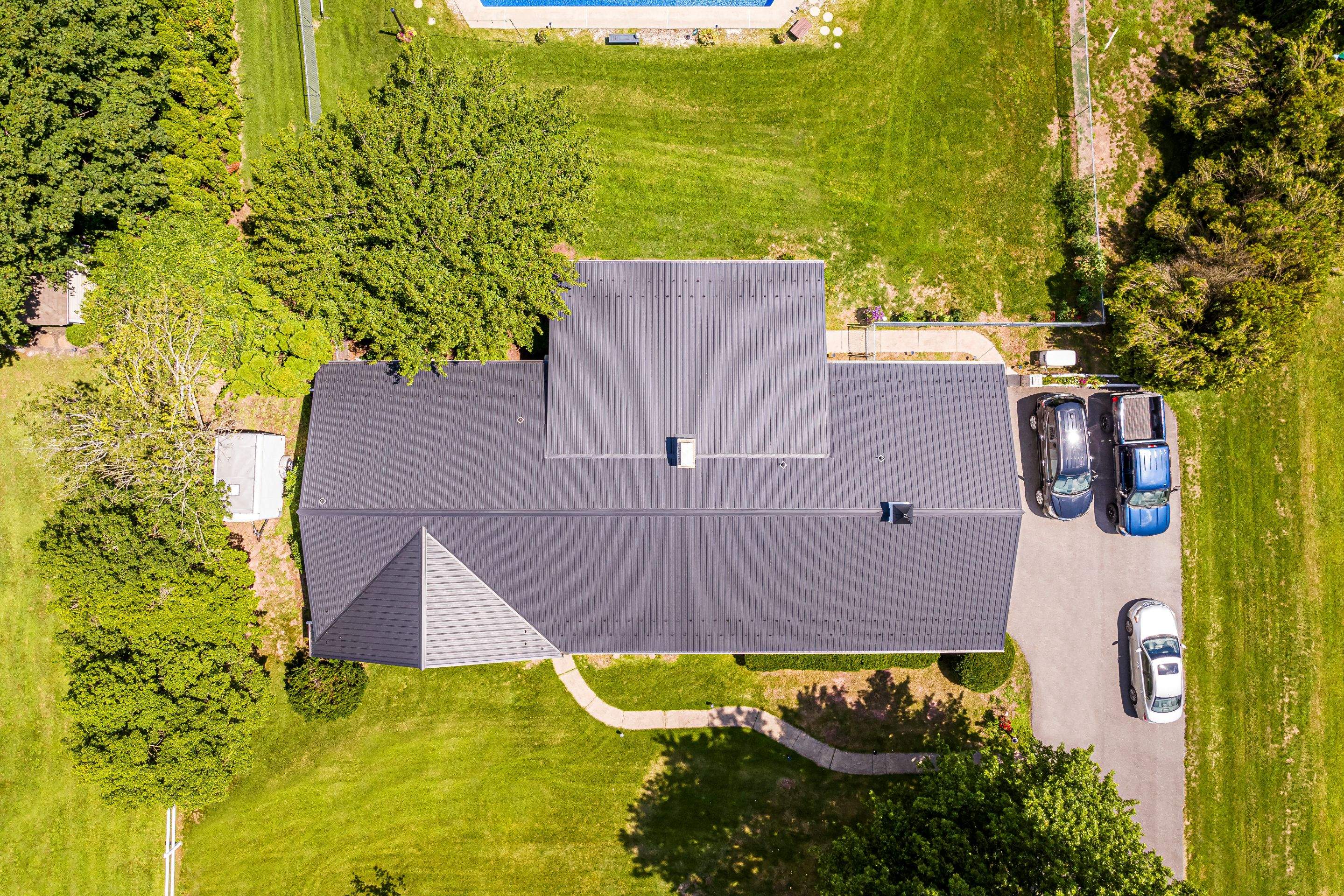 Metal Roof, Soffit and Fascia and siding by Esh Builders