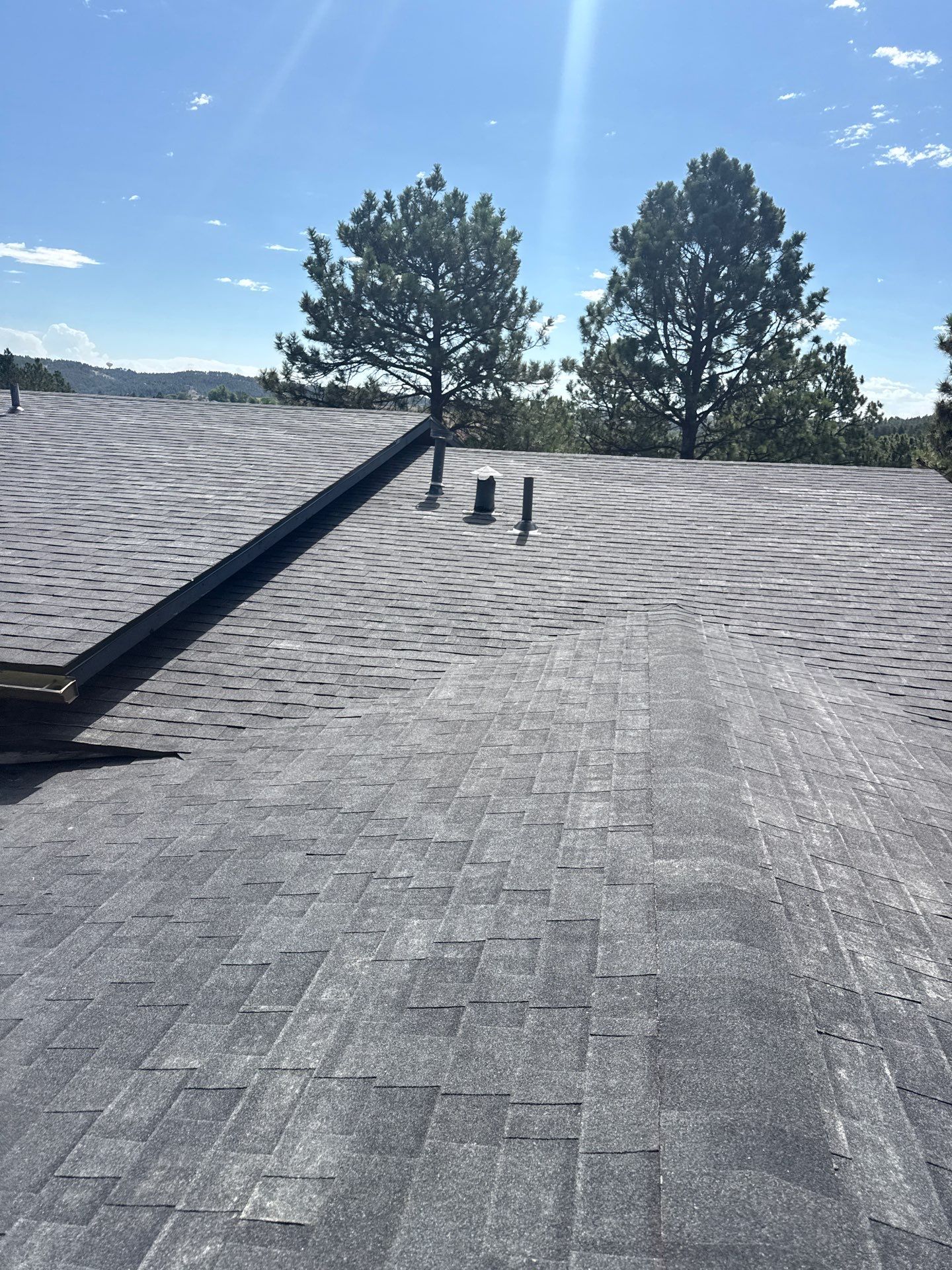 Full Architectural Shingle Installation for Contemporary Rapid City Residence by Weather-Tite Exteriors LLC