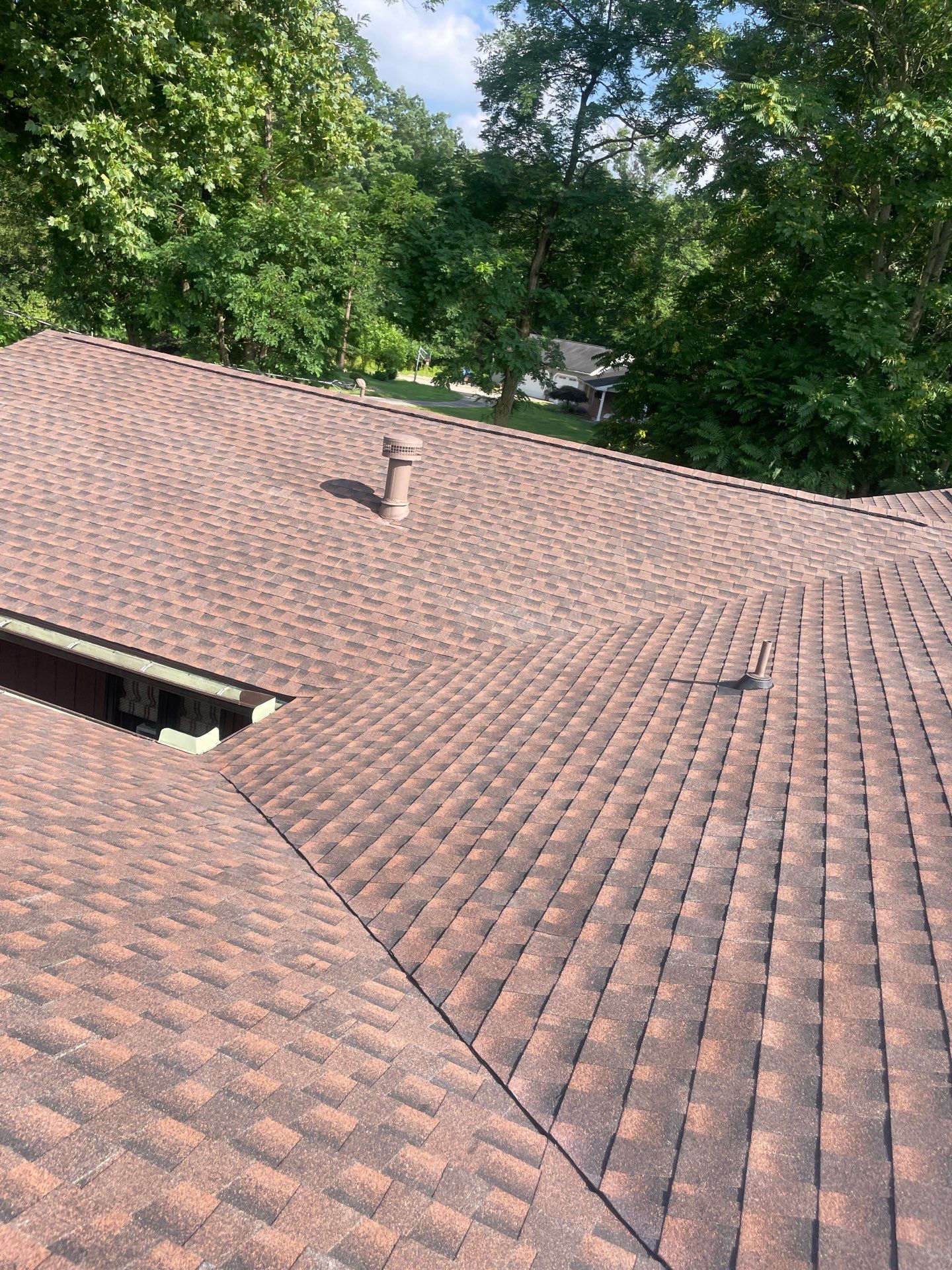 Residential Roofing Installation using GAF TImberline HDZ Hickory by Rainstoppers Roofing