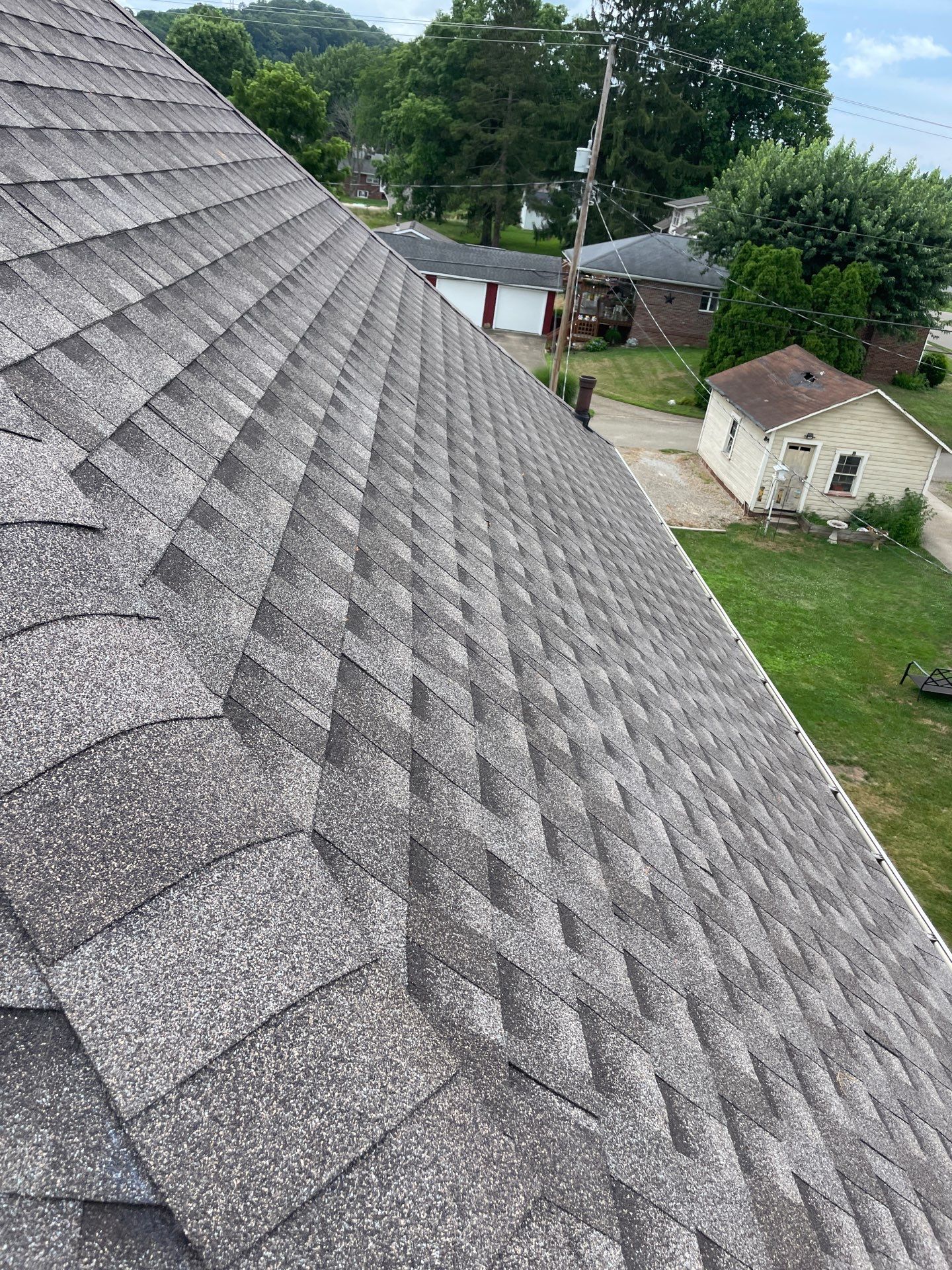 Residential Roofing Installation using GAF Timberline HDZ Charcoal by Rainstoppers Roofing