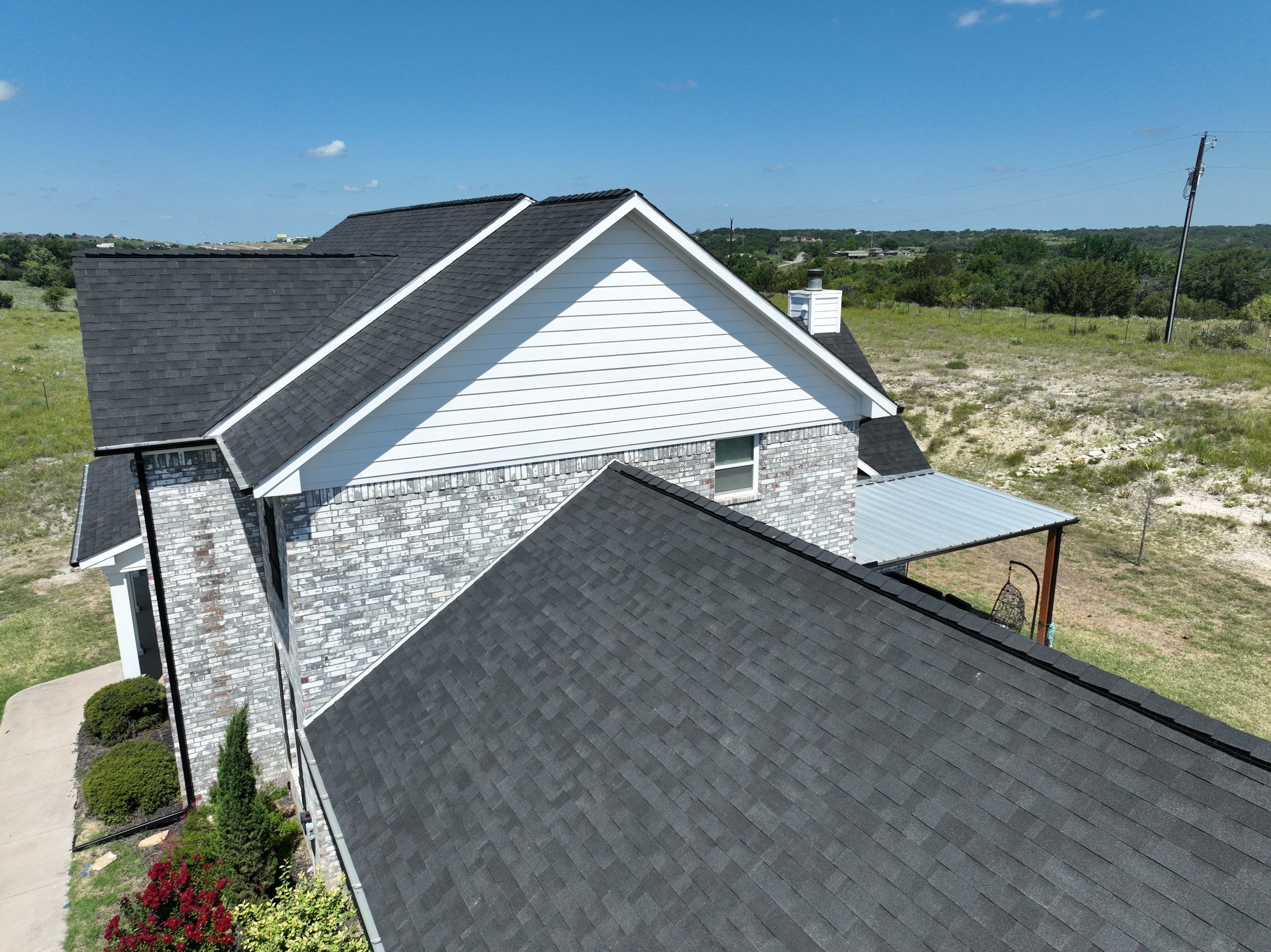 Residential Roofing Installation using Malarkey Highlander Brilliant Black by OneSource Roofing and Restoration
