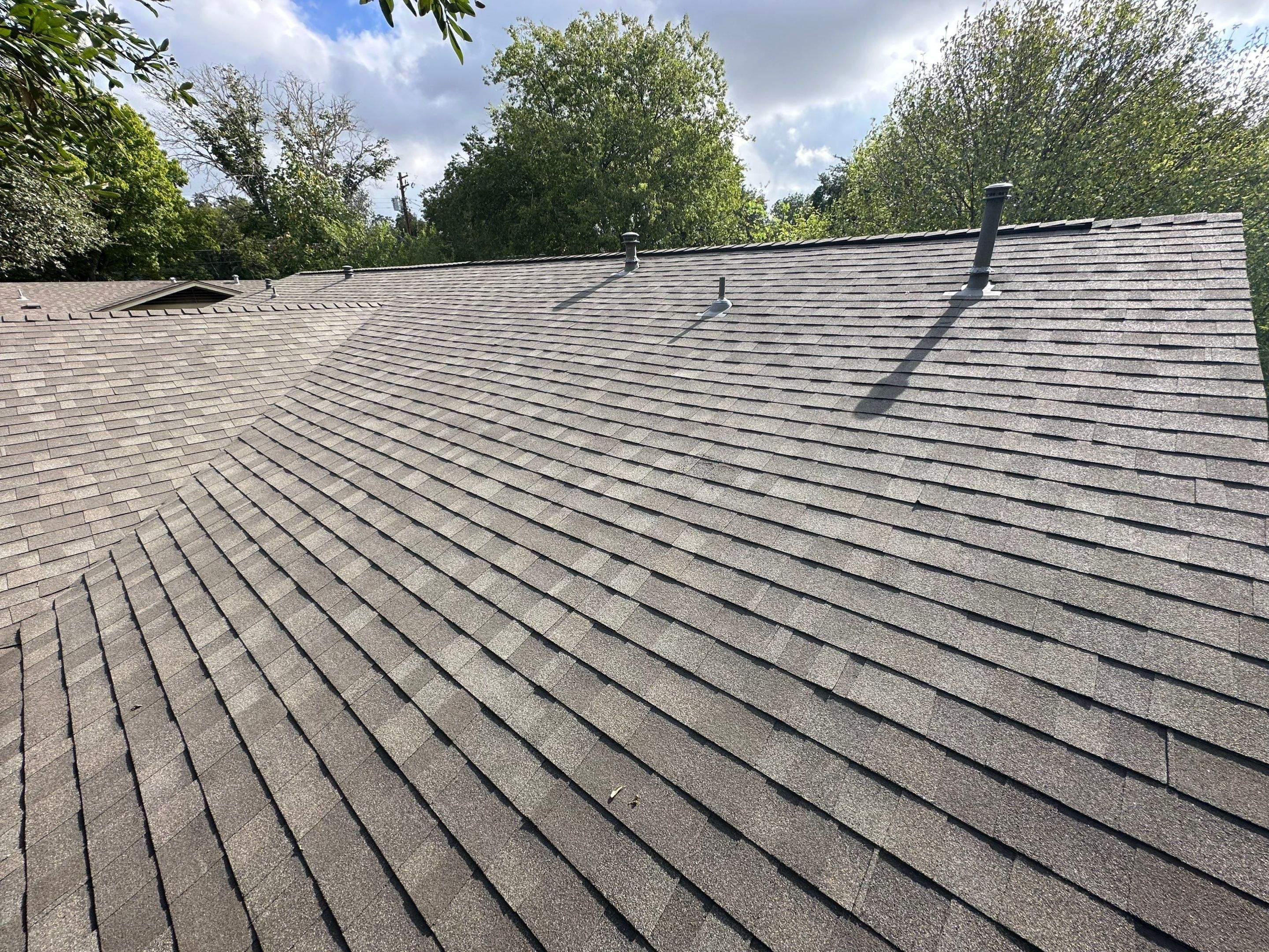 Driftwood Oakridge Roof on a Tree-Shaded Austin Home by Skywall Construction LLC