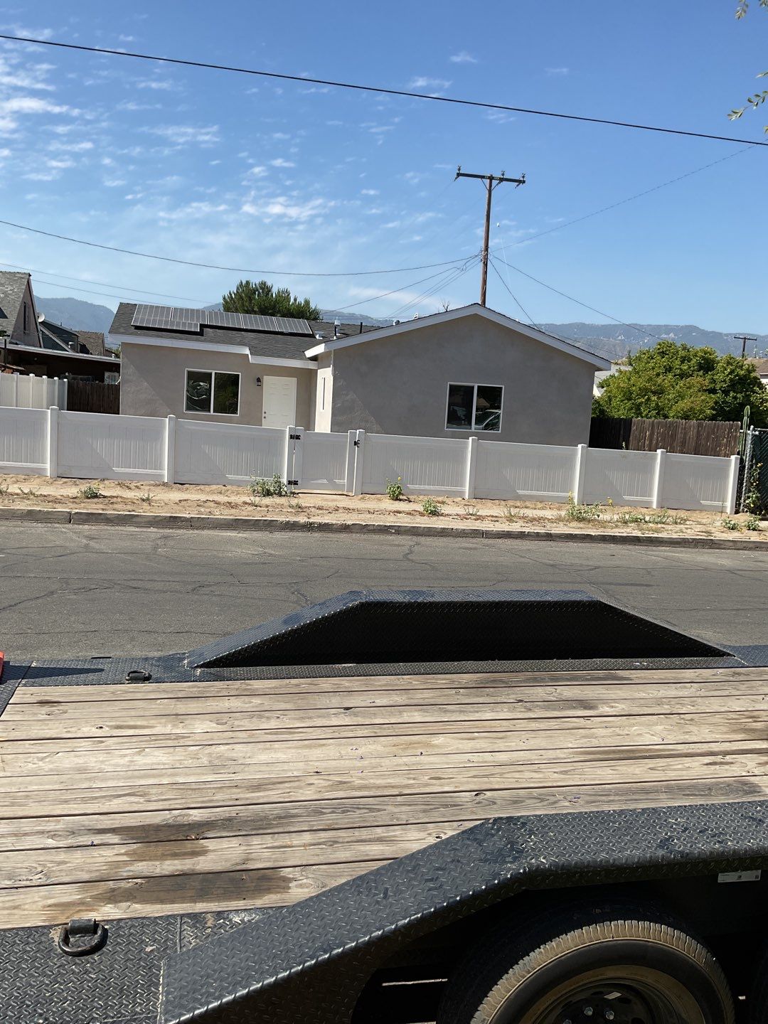 Fence installation using 6ft and 4ft vinyl  by Fence Guys Inc. 