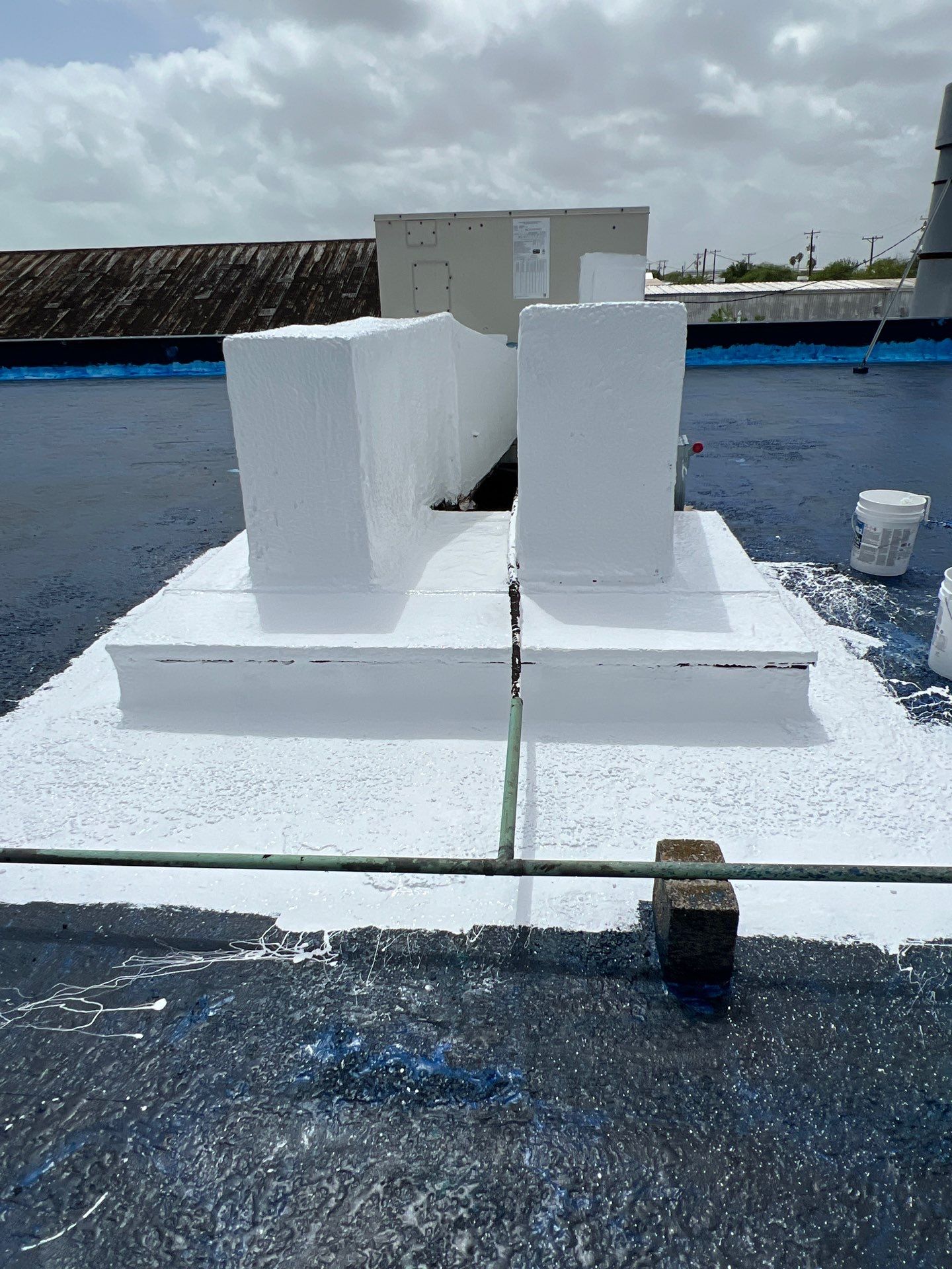 Dirty leaking Gravel Roof by Bayfront Roofing and Construction