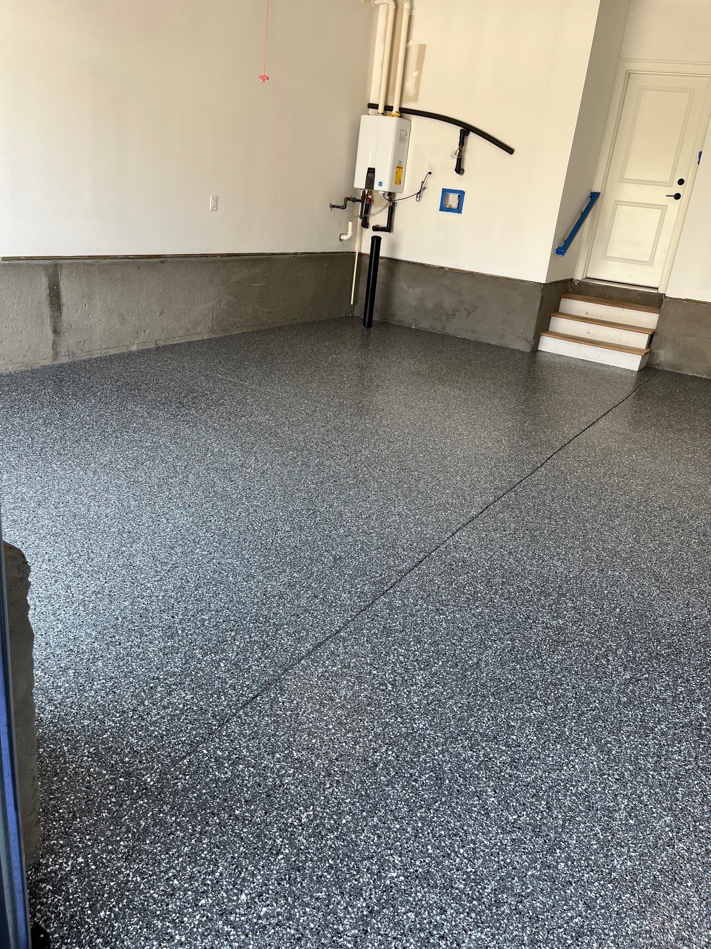 Garage Floor Coating using Wombat by My Garage Floor Guys