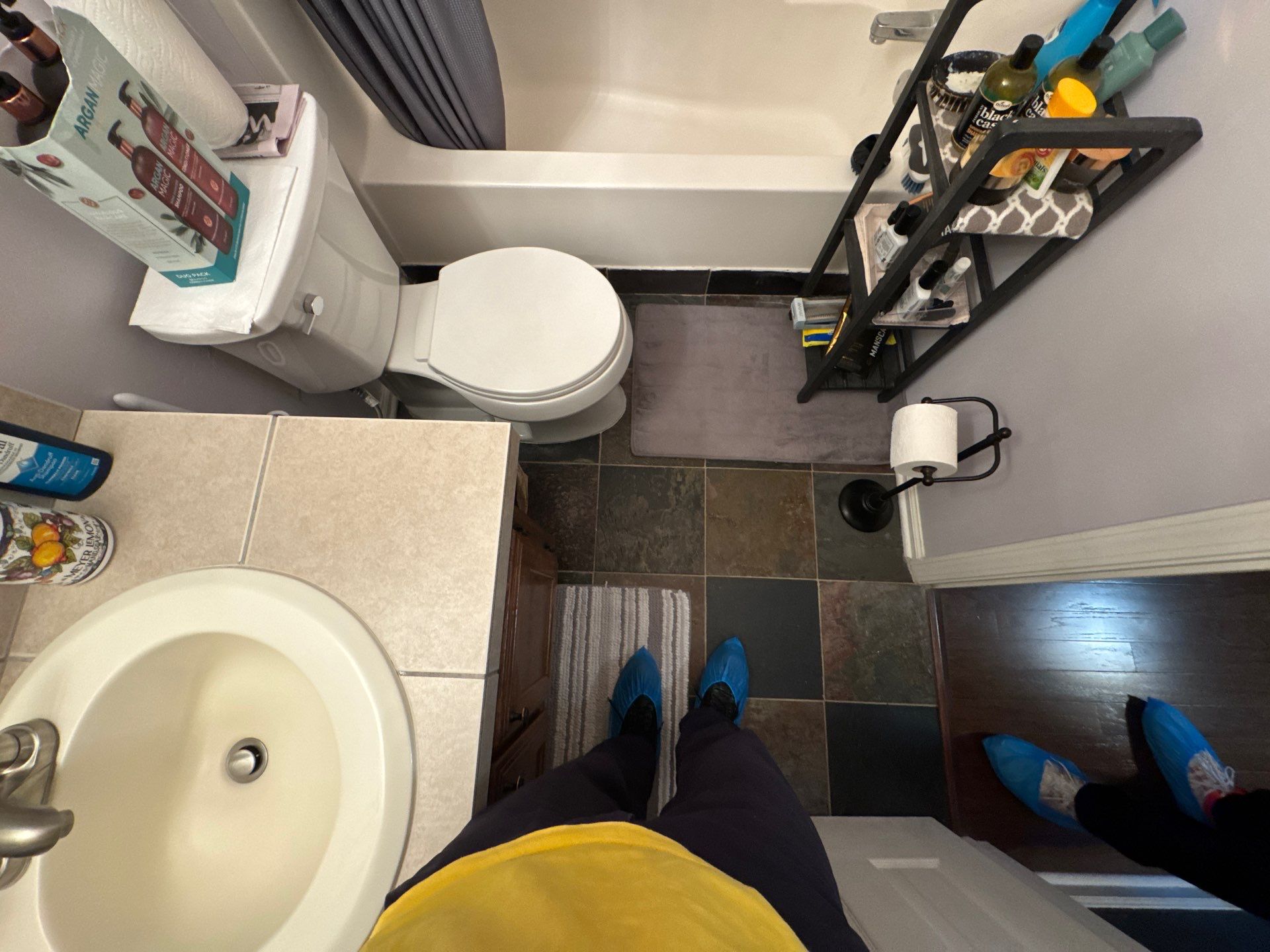Guest bathroom tub and flooring by Prudencio