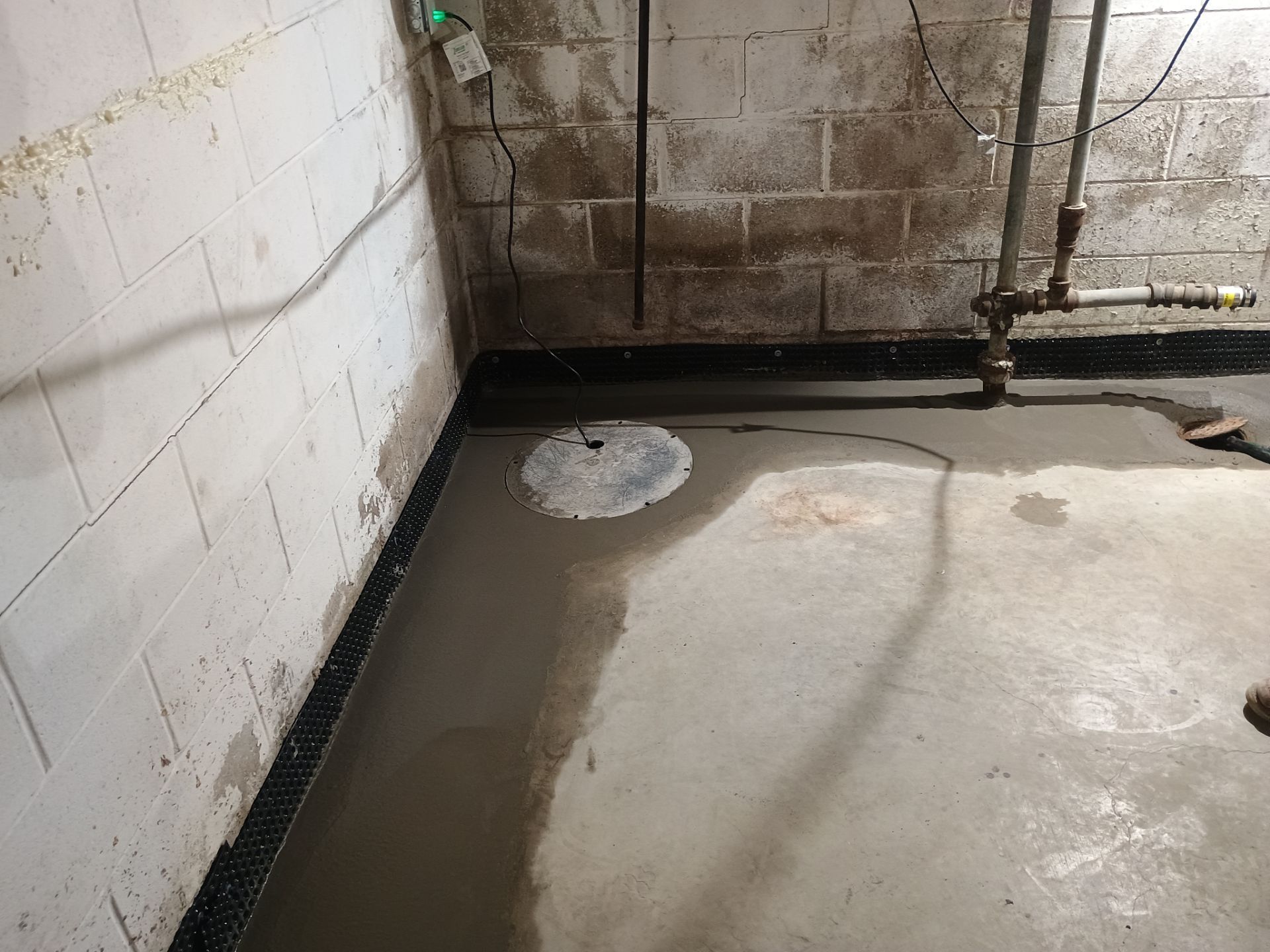 Interior Drain Tile Installation near Columbia Heights, MN by Waterproofing Northeast