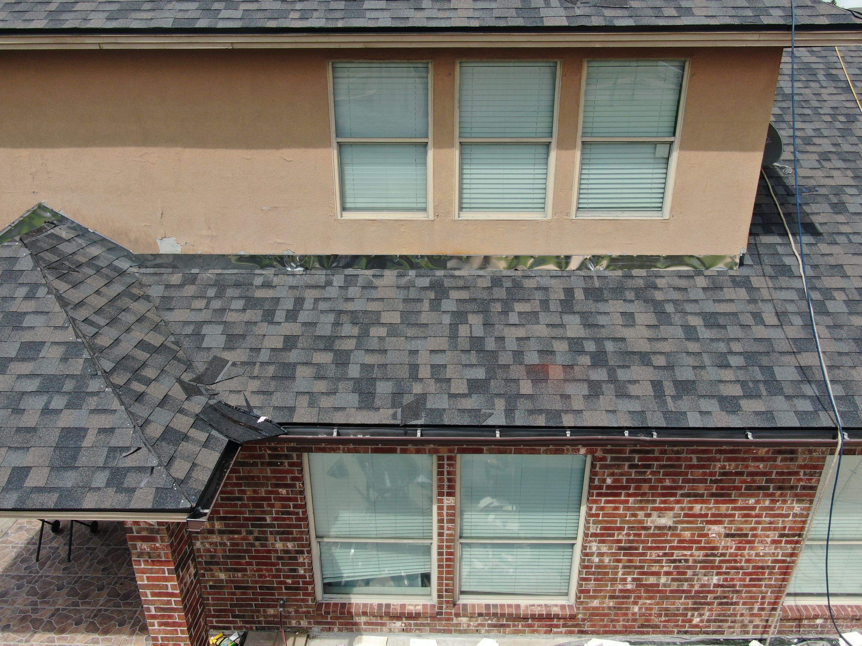 Flashing Stucco above the Roof by Bayfront Roofing and Construction