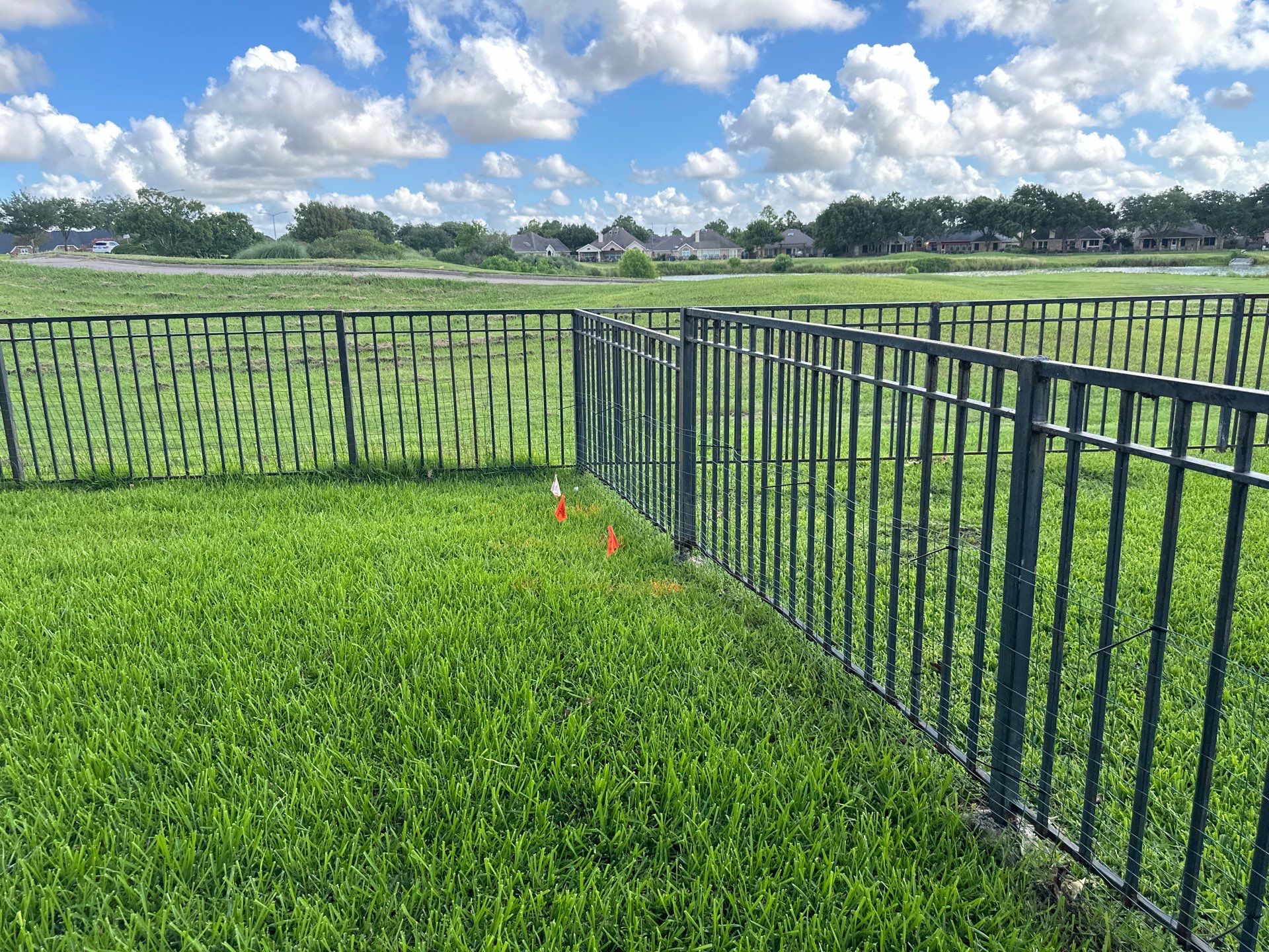 Stunning iron installation in Pearland by Tim's Fences