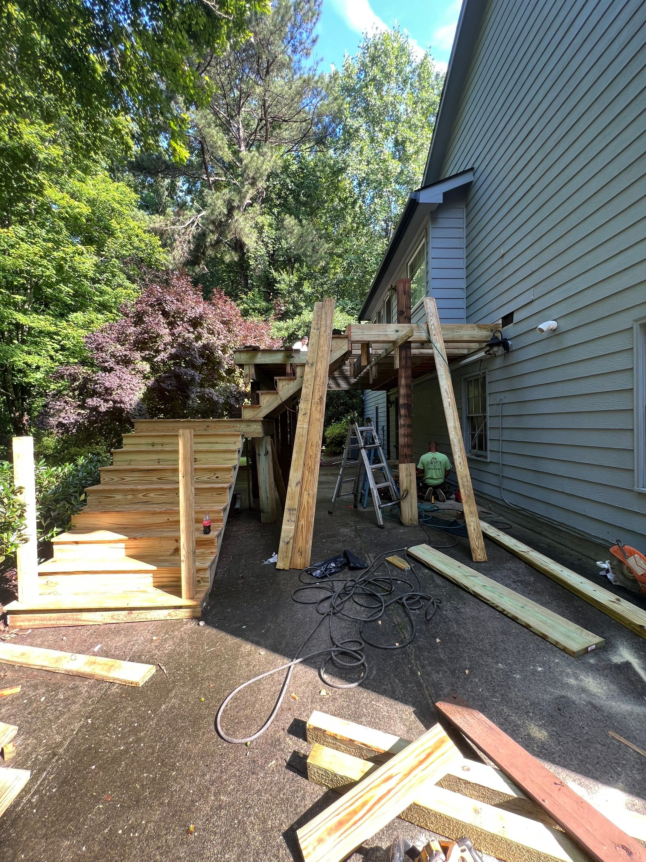Pressure-Treated Wood Deck Replacement and Staircase Installation in Kennesaw by Swift Home Renovations