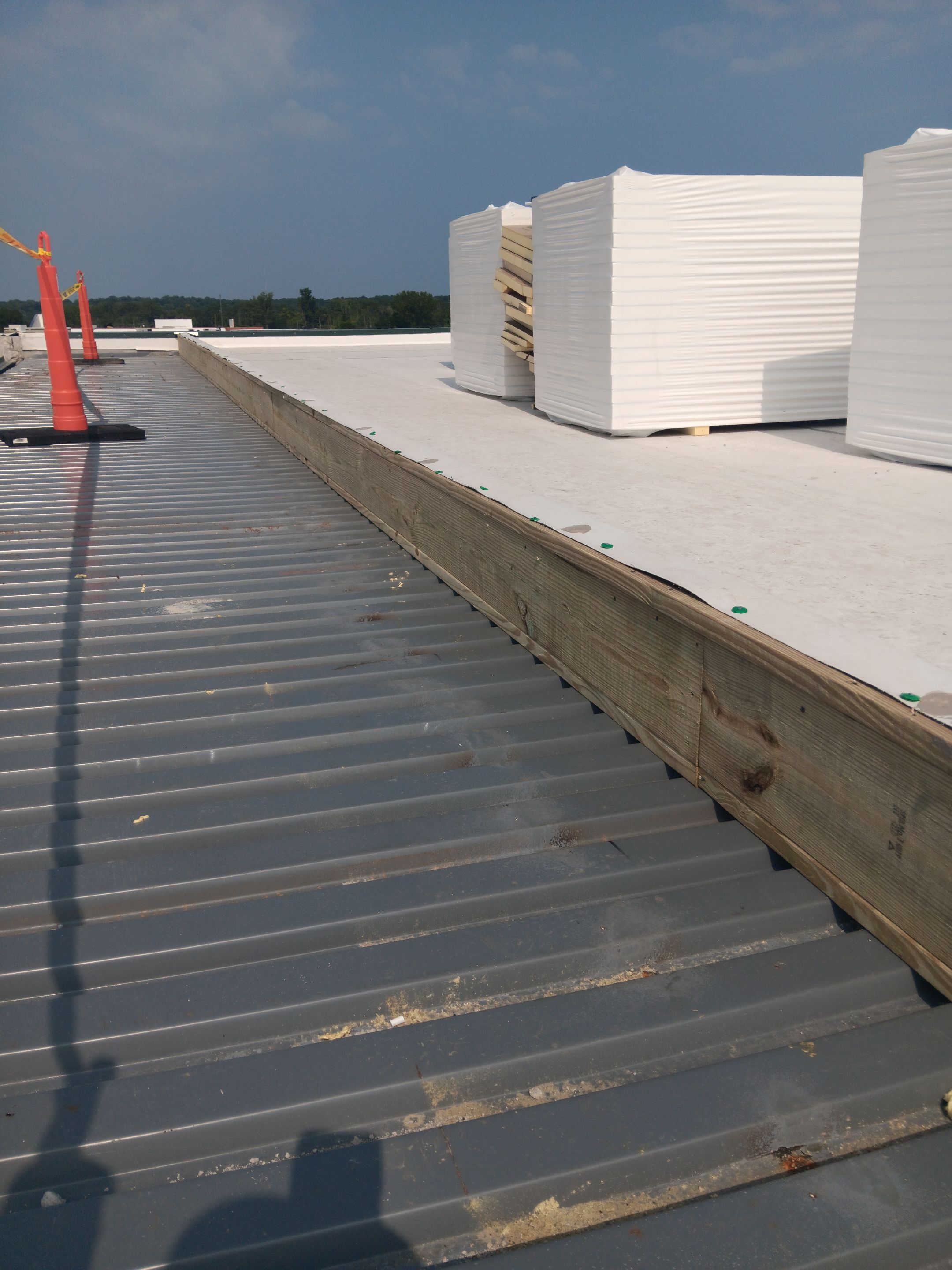 Commercial Roofing Installation using 60 mil GAF TPO by 3 Daughters Construction 