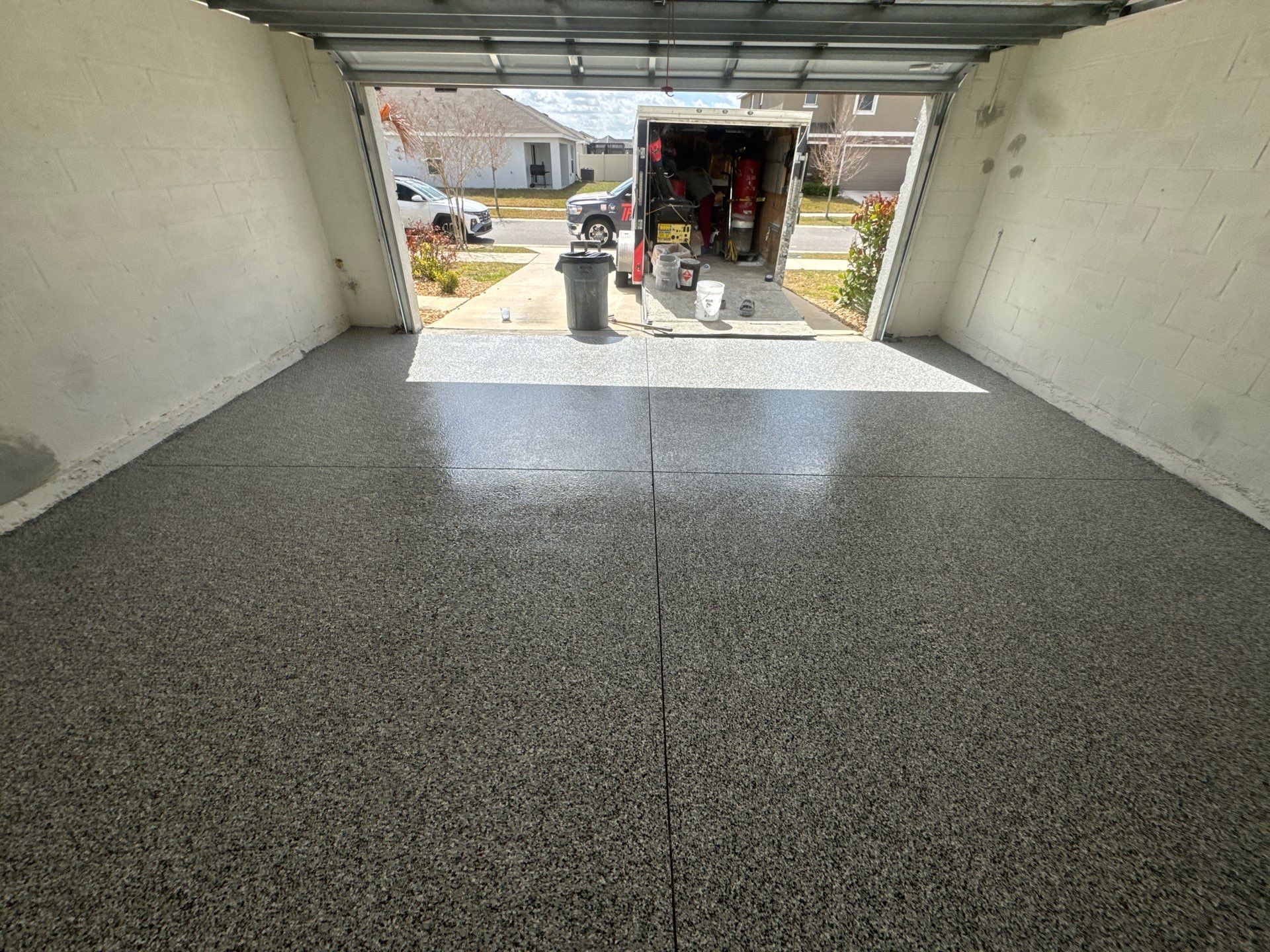 The Domino Effect: Ultimate Showroom Garage by Performance Floors & Coating