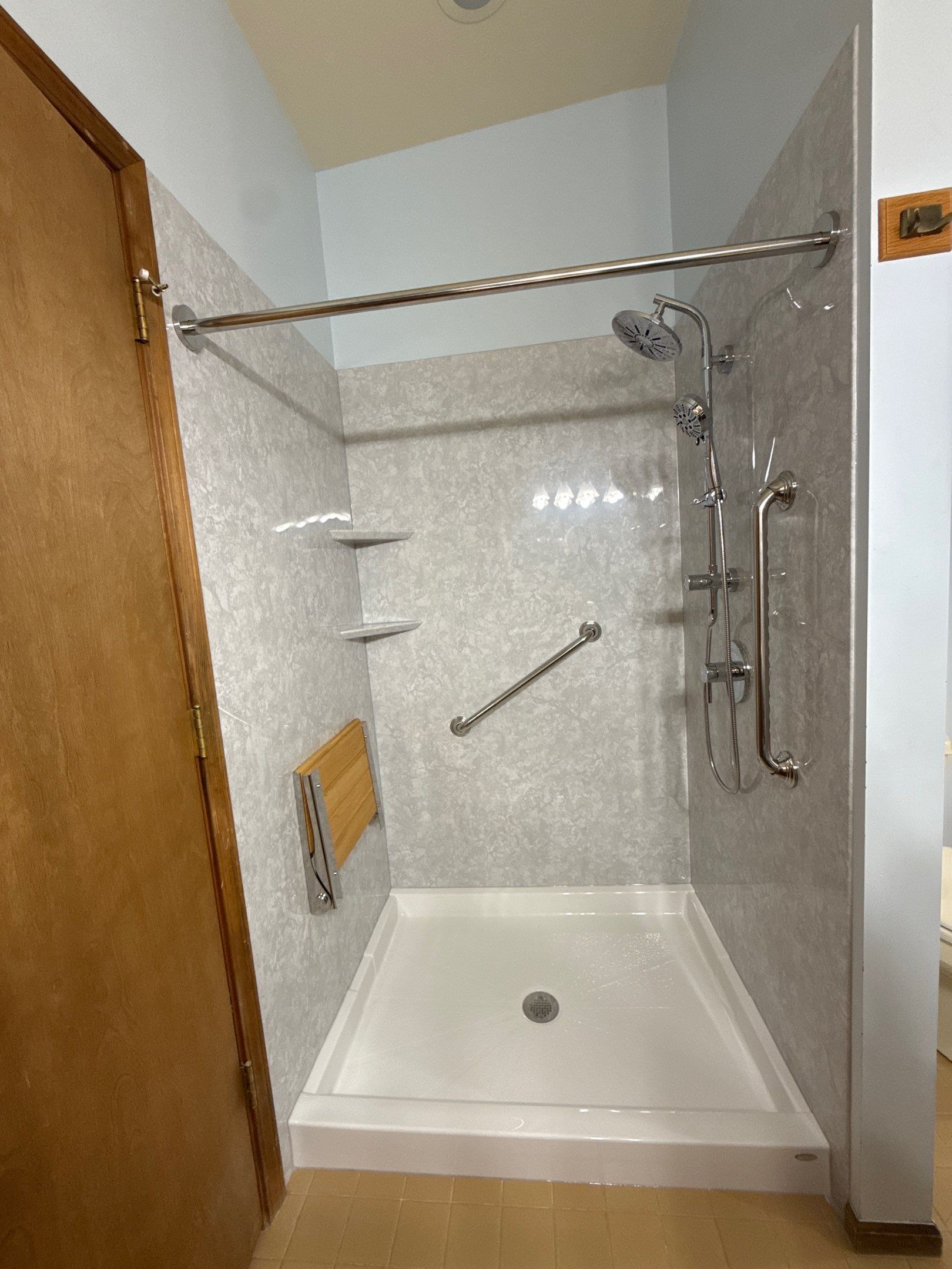 Walk-In Shower Replacement with Marbled Panels in Indian River by Rainbow Seamless Systems