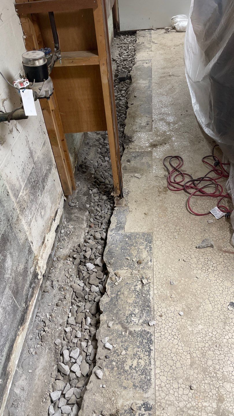 Interior Waterproofing Using GrateDrain™ Products by Toledo Basement Repair 