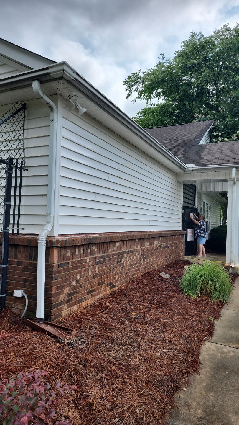 House Wash using cleaner by Power Wash Masters LLC