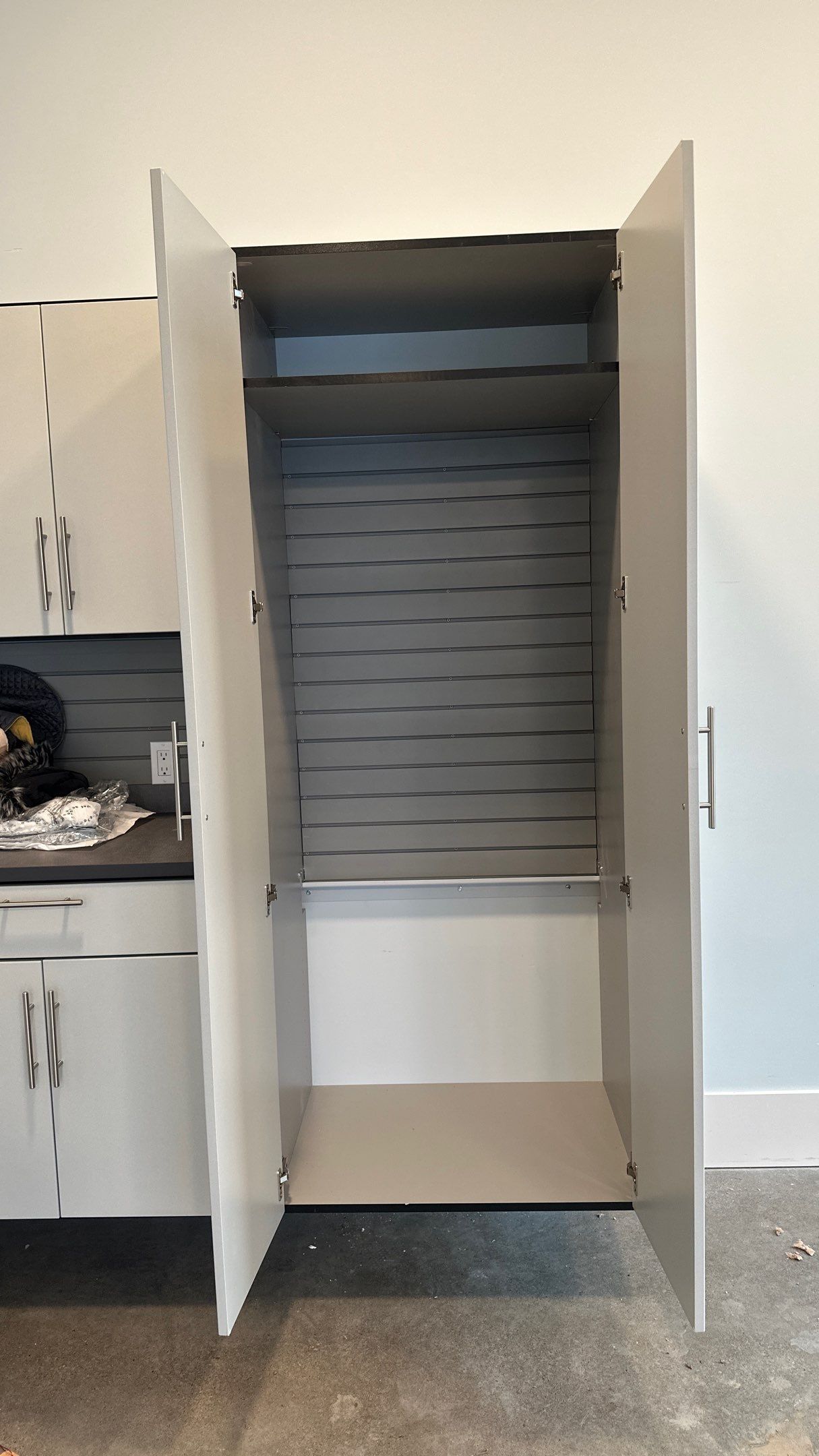 Bryon V. upgrades garage with cabinets and heavy duty slatwall by Banner Garage