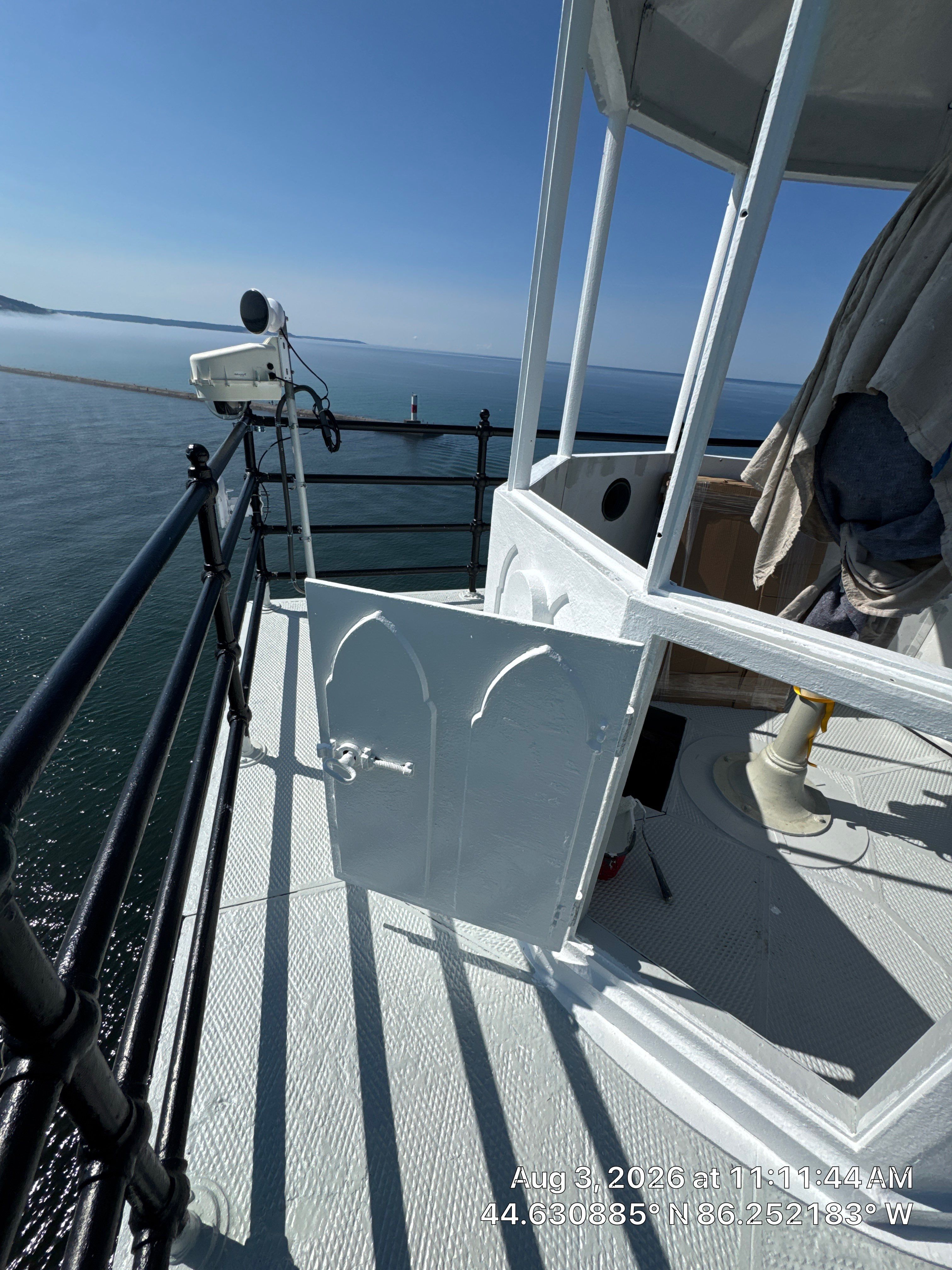Historical Restoration and Coating of Frankfort North Breakwater Lighthouse by Finkle Preservation & Construction 