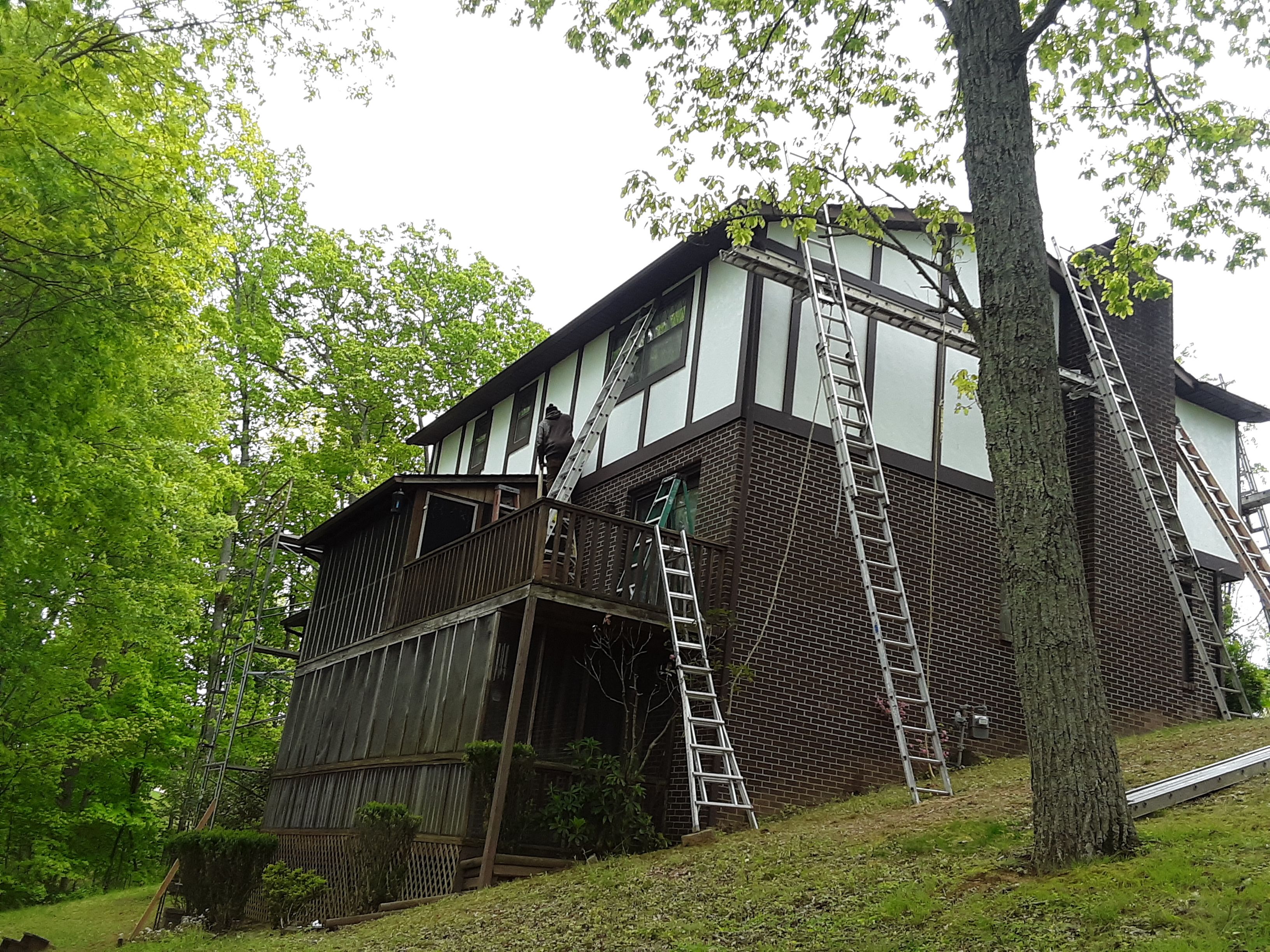 Old to New Tudor Style Fiber Cement Update  by Secure Construction Company Inc