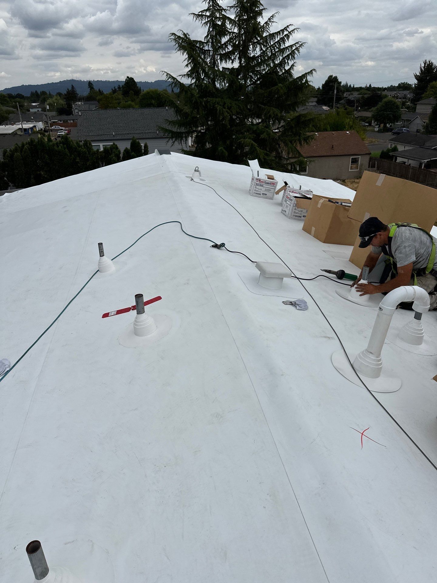 Commercial Flat Roof Installation using GAF 60Mil TPO  by Orezona Building & Roofing Company, Inc.